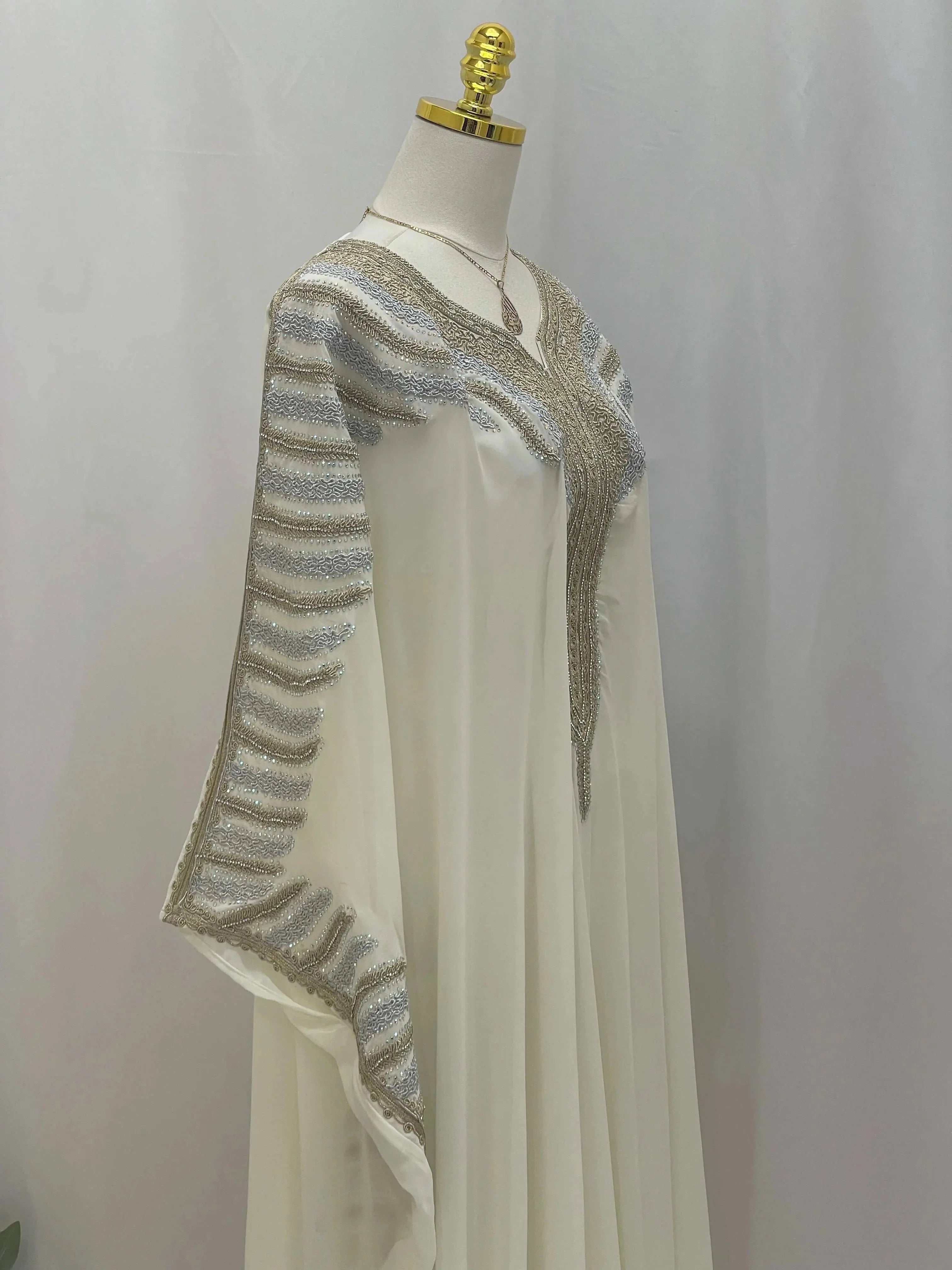 Palestinian Elegance Dana Free Size Kaftan Abaya in white with silver embroidery on sleeves and neckline