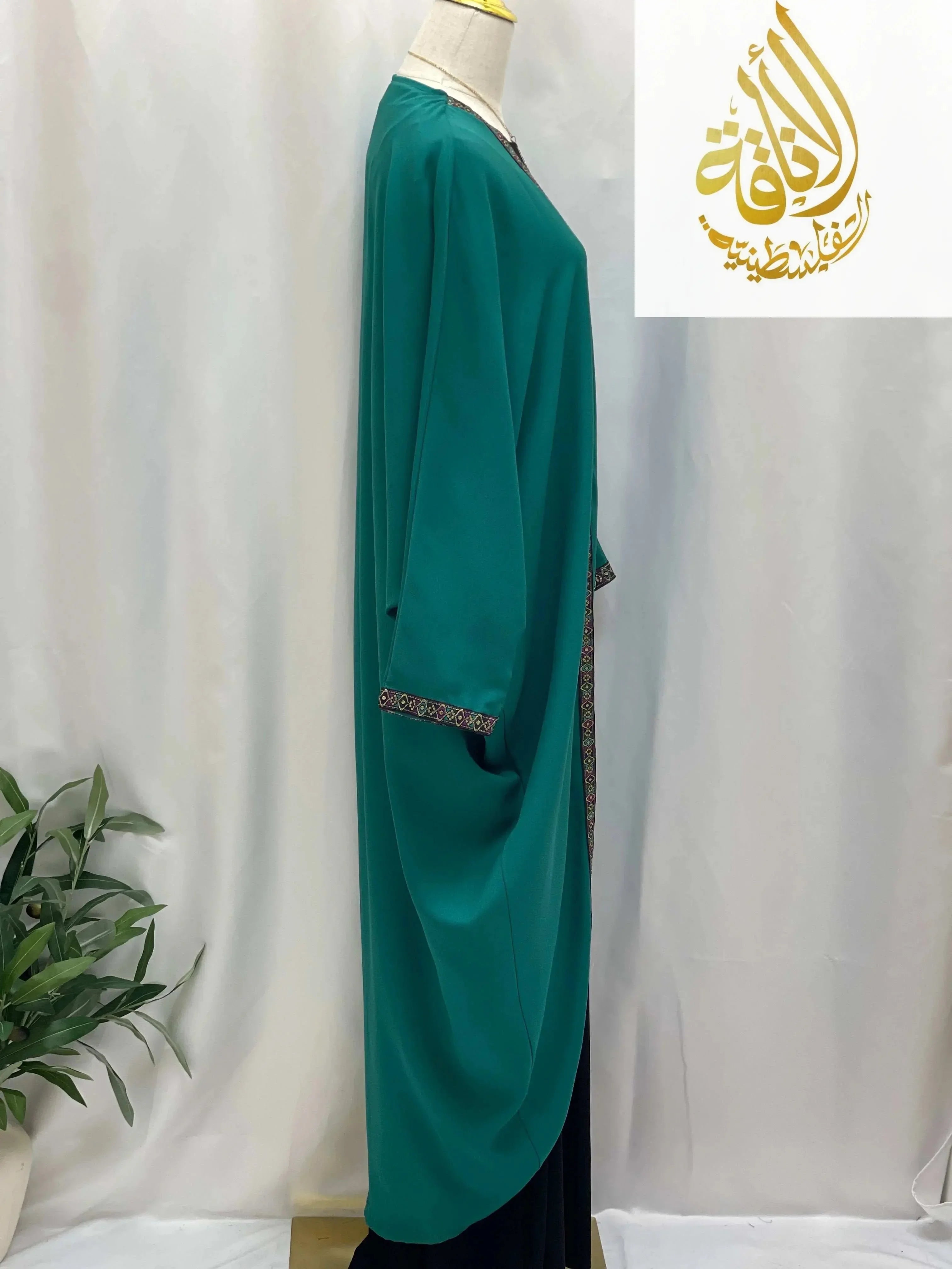 Palestinian Elegance Dana Free Size Kimono cardigan in teal with embroidered trim on cuffs and front