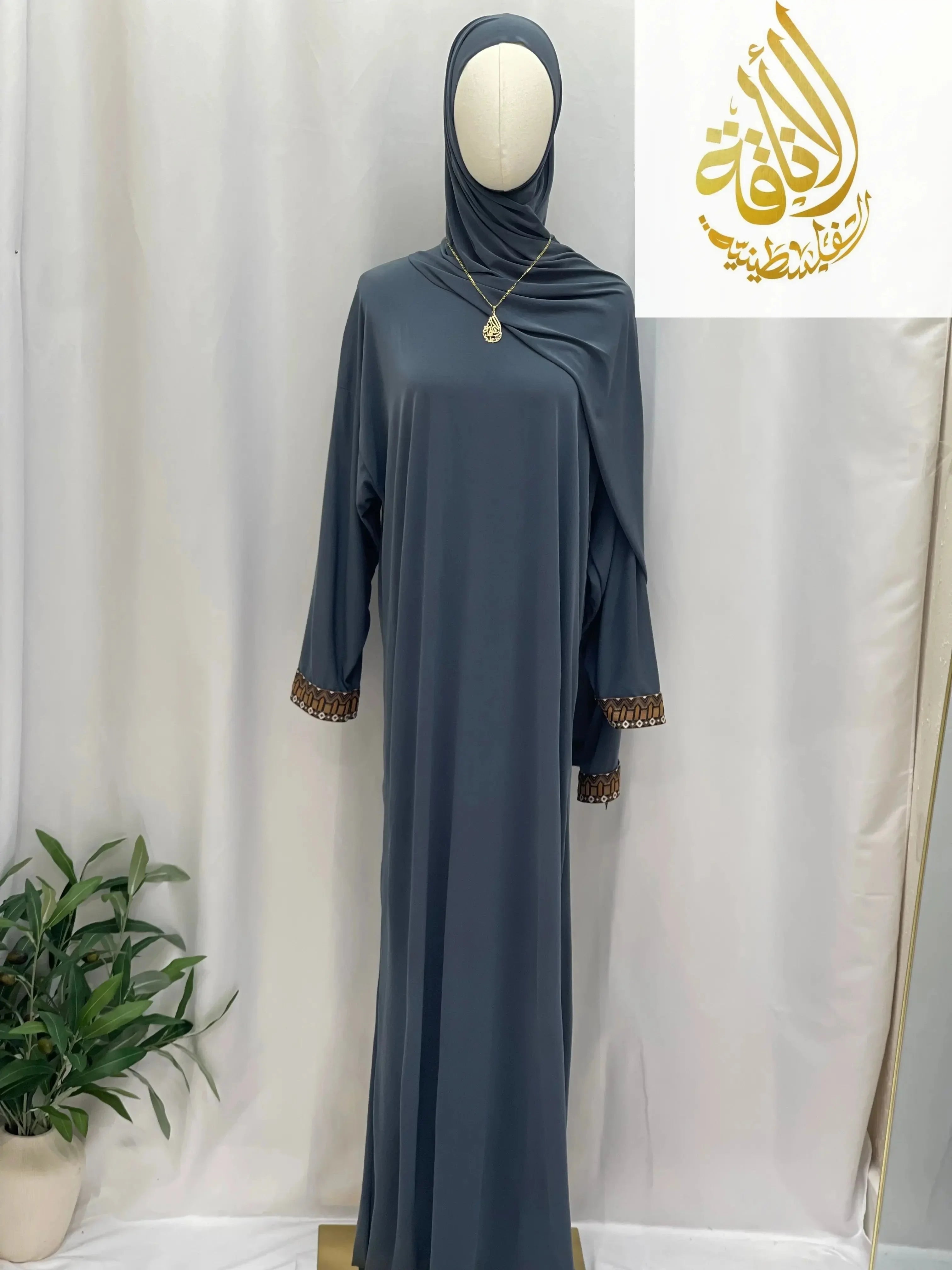 Palestinian Elegance one piece prayer dress abaya in dark blue with detailed cuffs and matching hijab