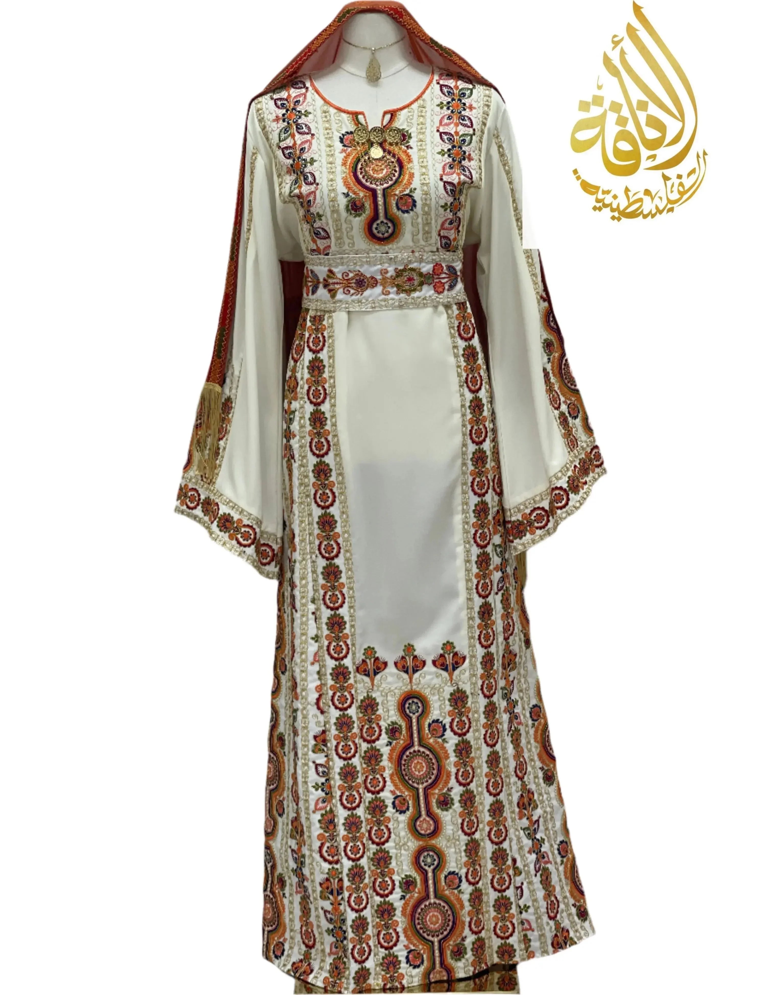 Salma Ivory Embroidered Thoub by Palestinian Elegance featuring detailed traditional embroidery on flowing ivory fabric