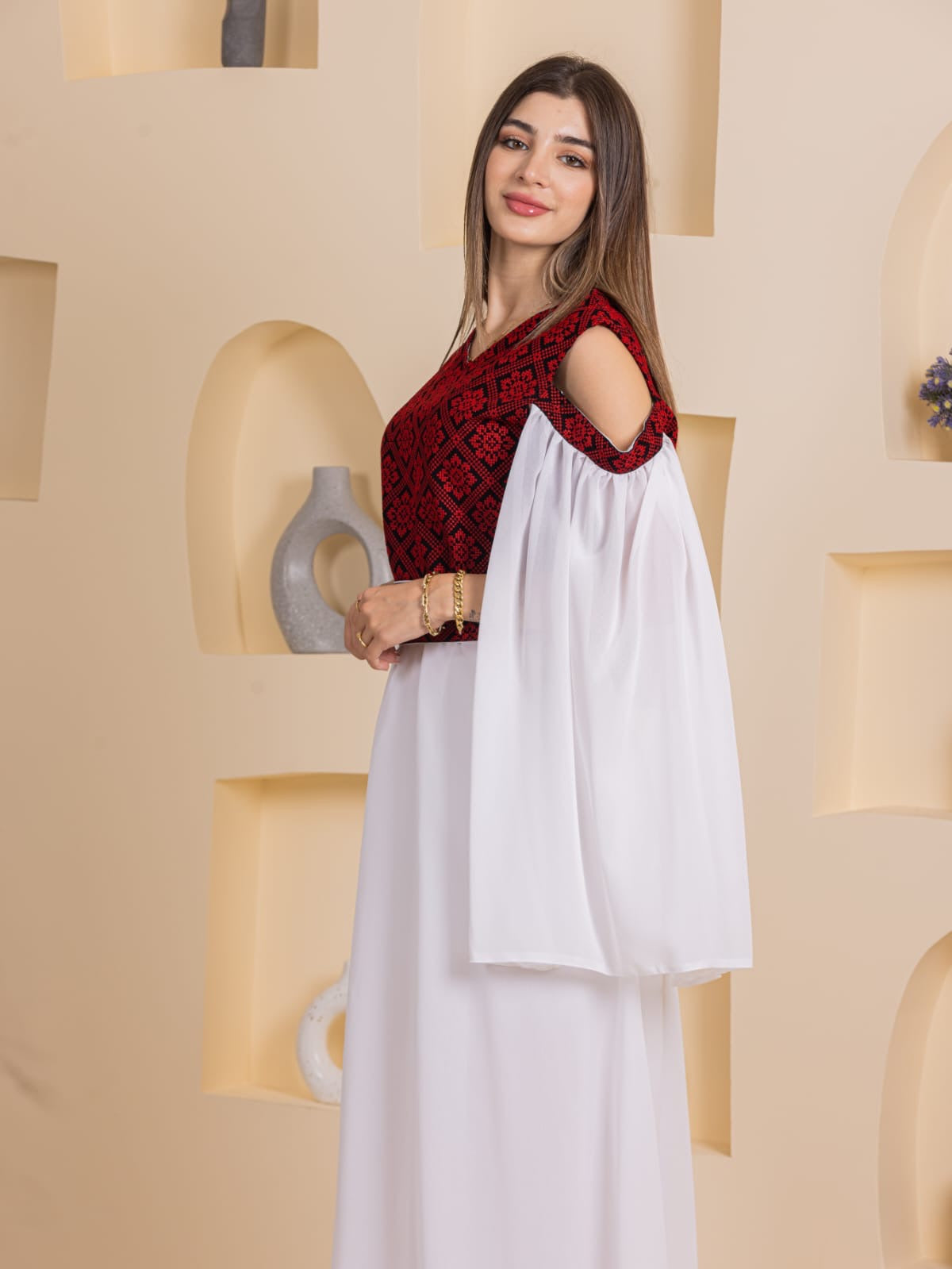 Palestinian Essence Dress by Palestinian Elegance white flowing skirt red embroidered bodice cold shoulder sleeves