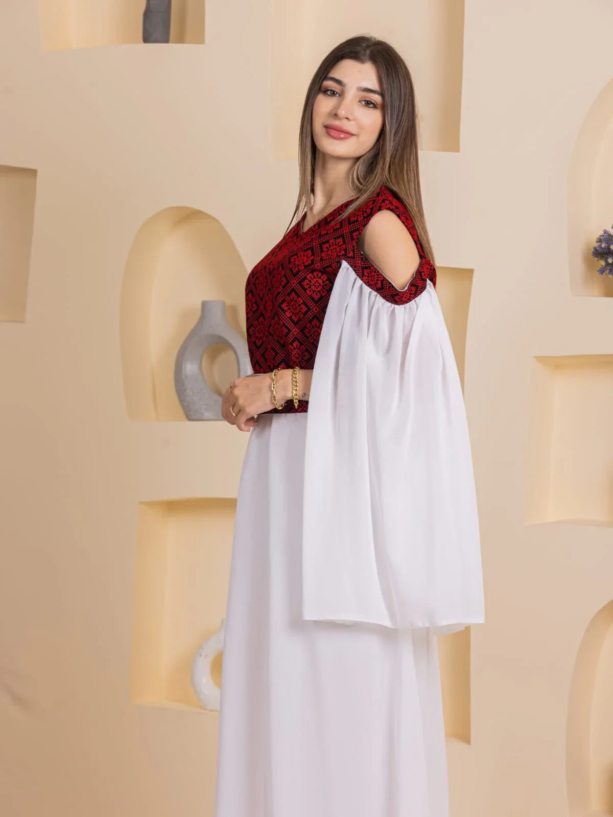 Palestinian Essence Dress by Palestinian Elegance white flowing skirt red embroidered bodice cold shoulder sleeves