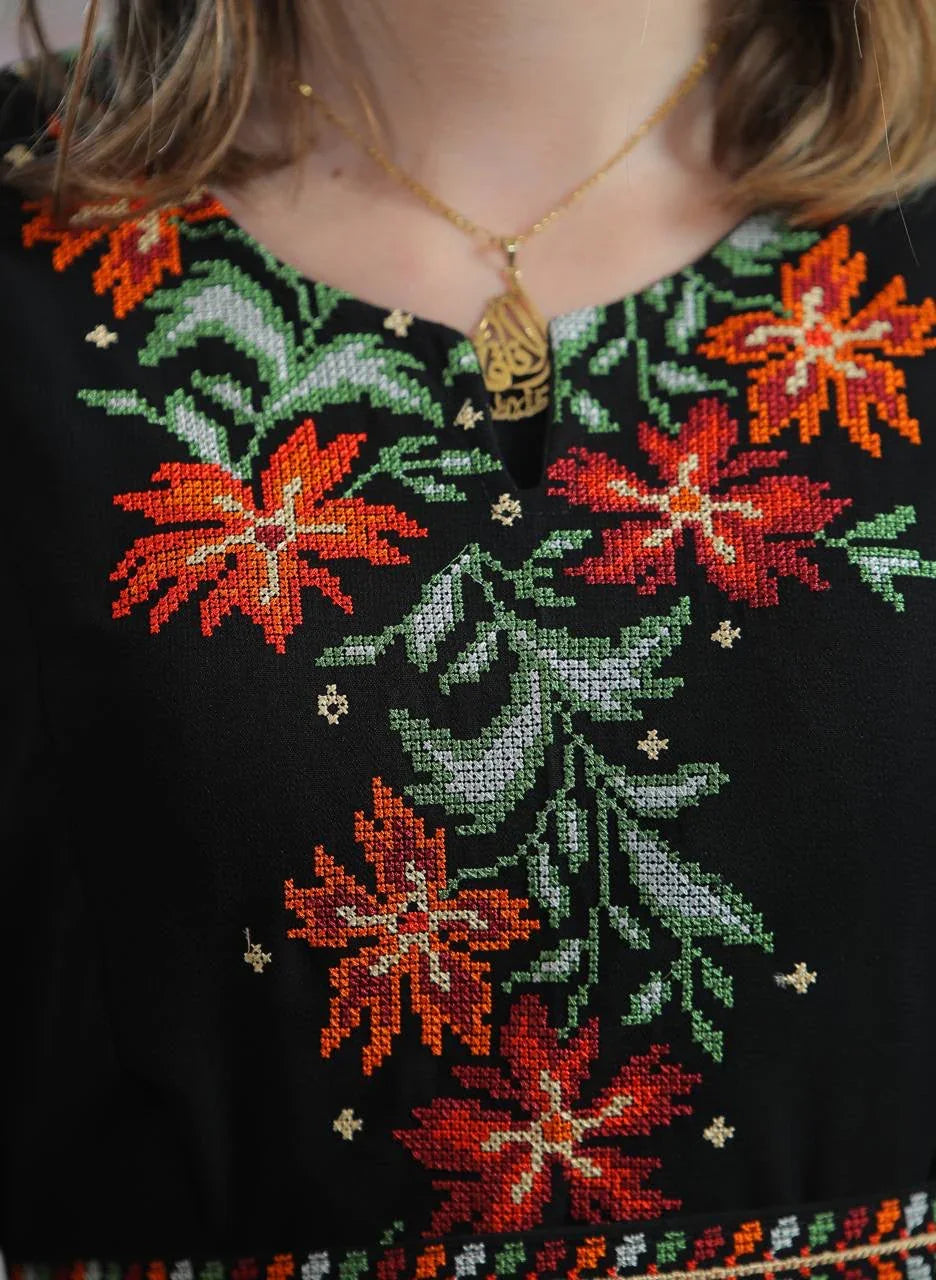 Close-up of Rose Embroidered Dress Abaya featuring vibrant floral designs and elegant neckline