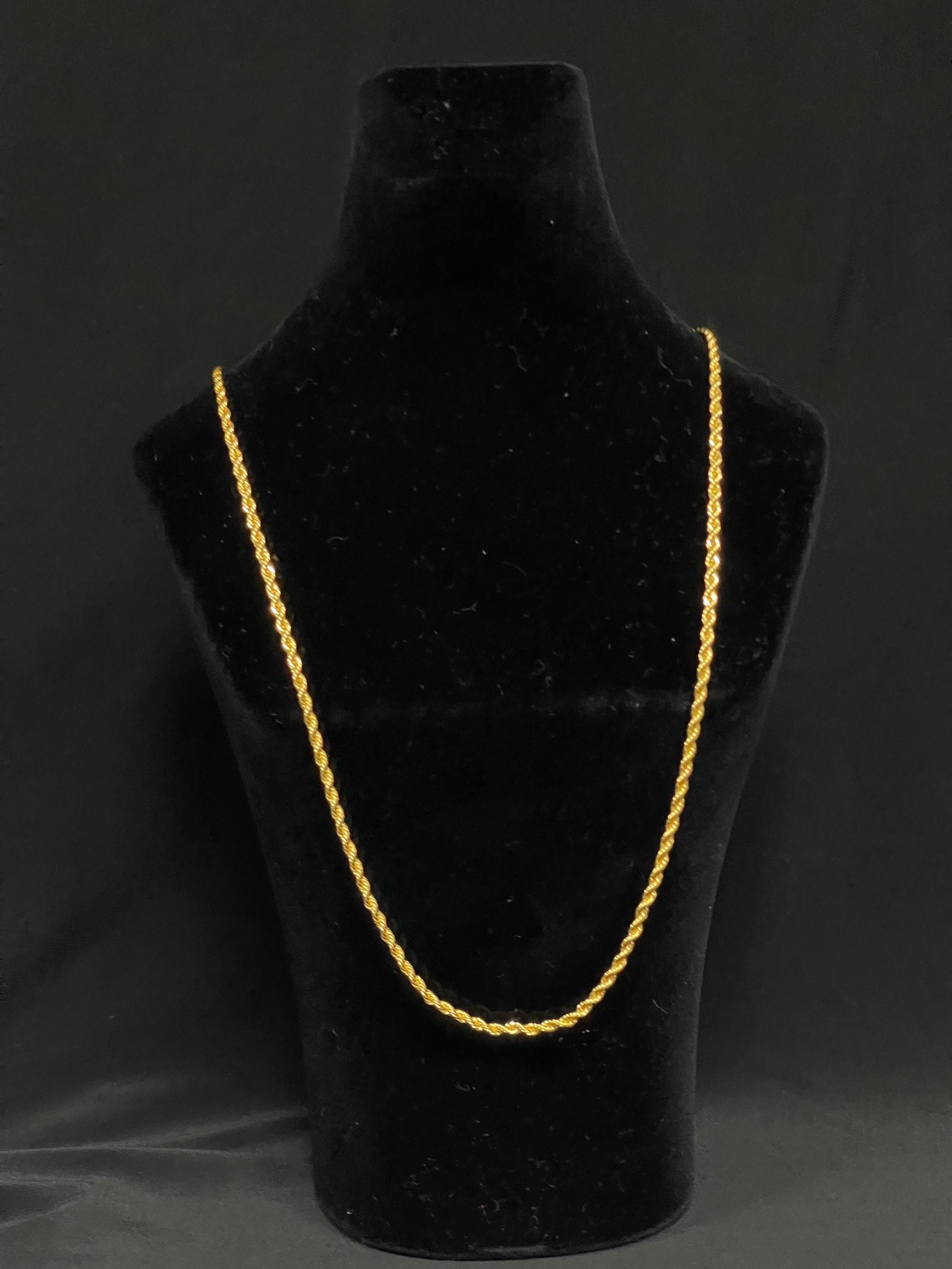 Plain Imitated Gold Necklace displayed on black velvet stand by Palestinian Elegance