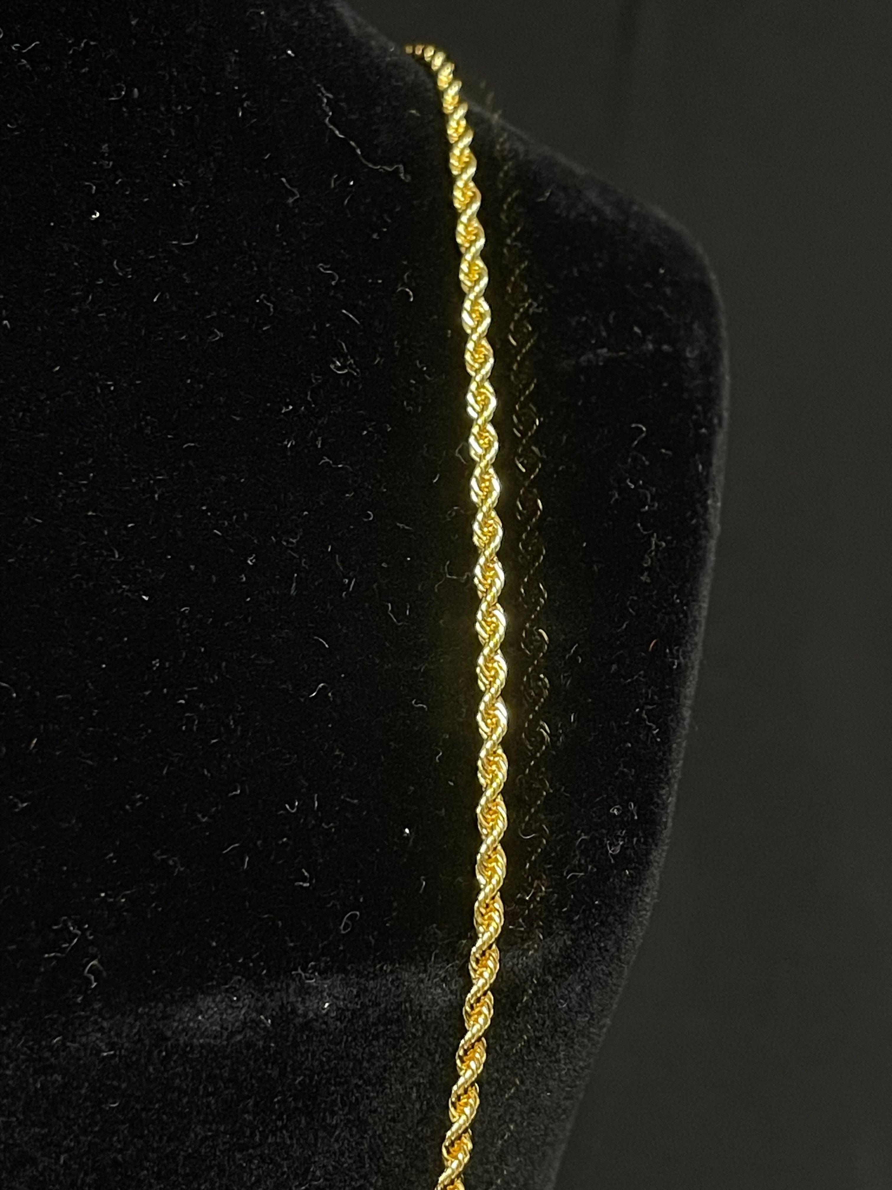 Plain Imitated Gold Necklace with twisted rope design displayed on black velvet stand