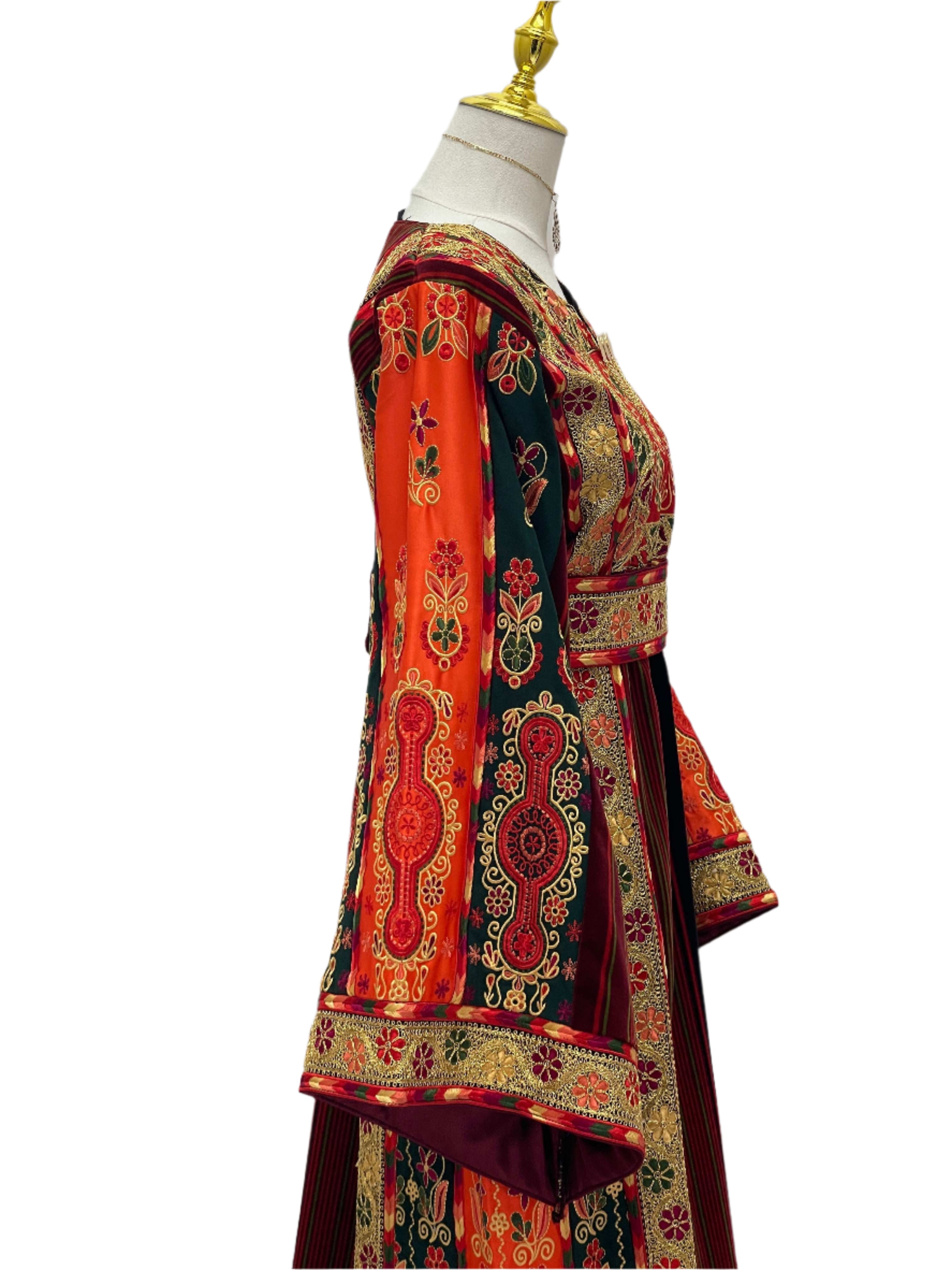 Palestinian Elegance embroidered Janna & Nar Malaka Kasab Thoub dress with intricate colorful patterns