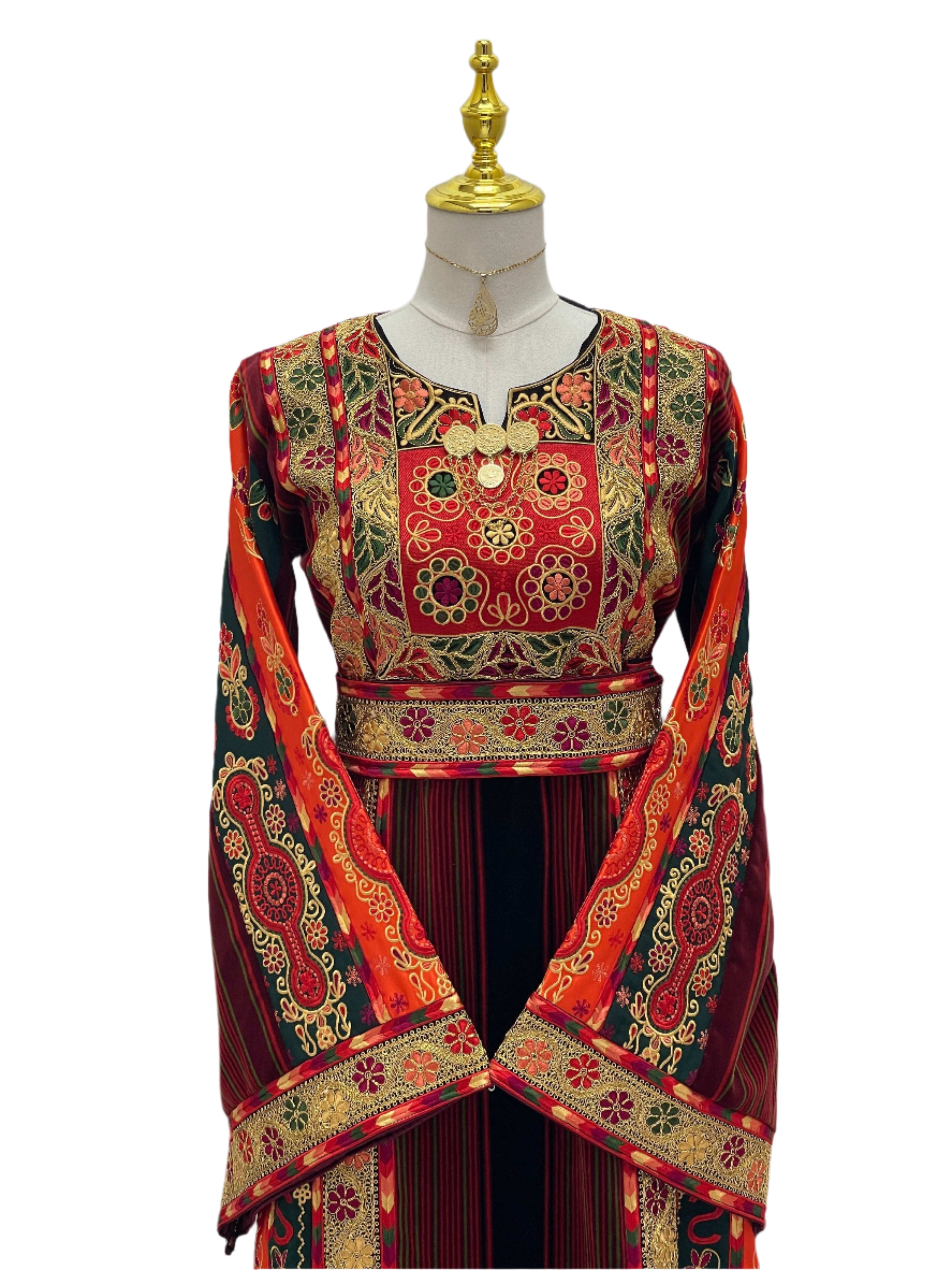 Embroidered Janna & Nar Malaka Kasab Thoub by Palestinian Elegance featuring intricate red and gold patterns on traditional dress