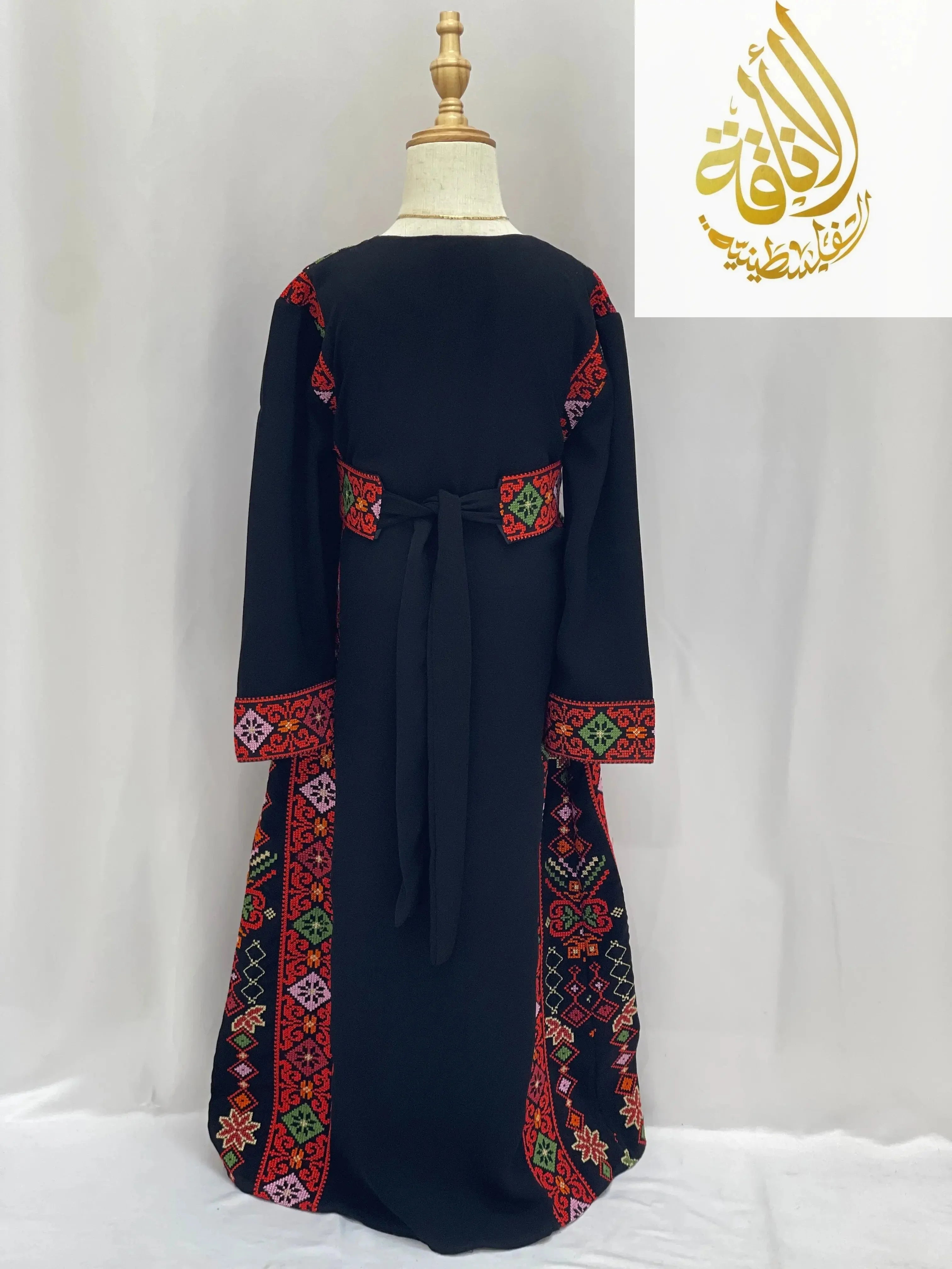 Palestinian Elegance embroidered thoub for girls in black with colorful traditional embroidery on sleeves and sides