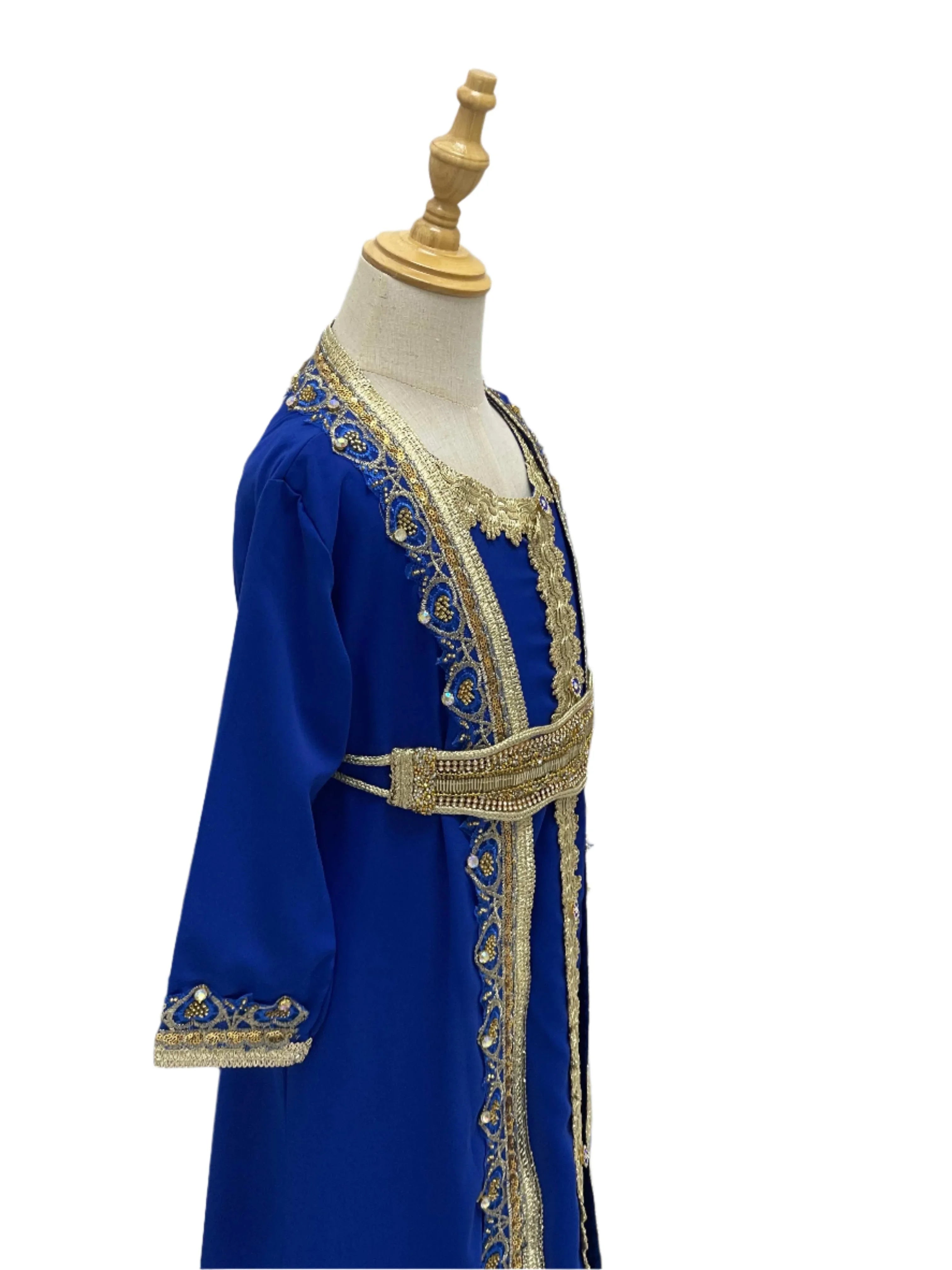 Palestinian Elegance Princess Mariam Long Sleeve Kaftan Dress in royal blue with gold embroidery on mannequin