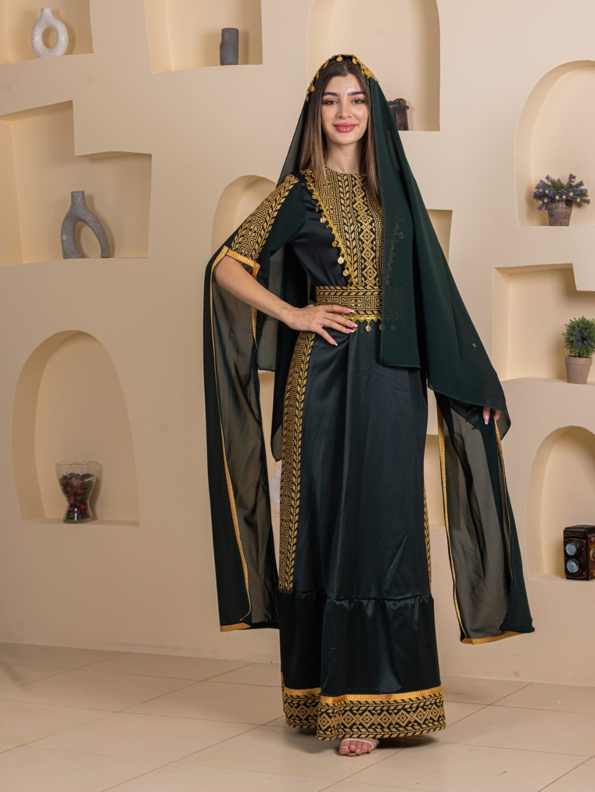 Qamar Embroidered Dress by Palestinian Elegance full length dark green gown with gold embroidery and matching headscarf