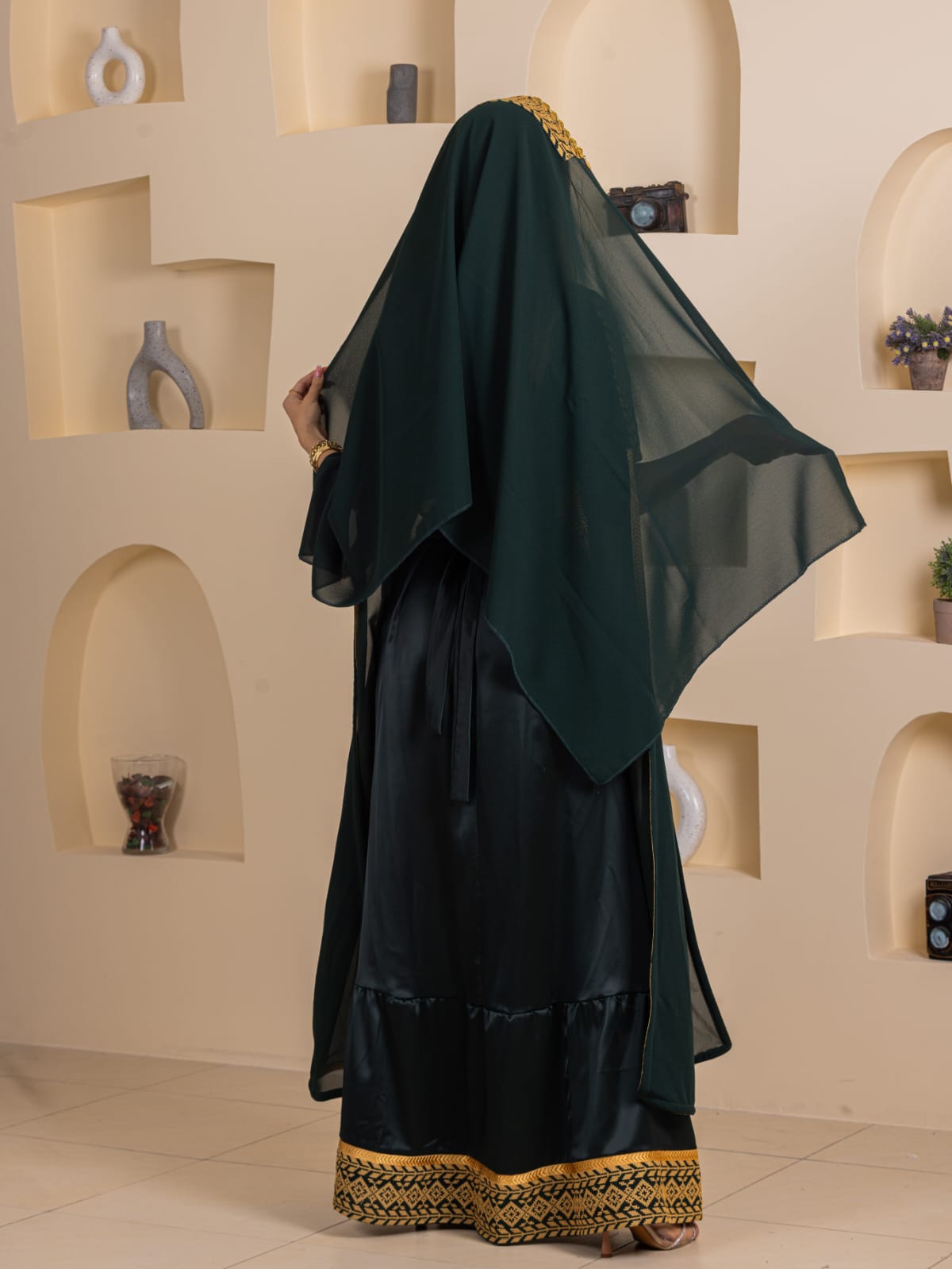 Qamar Embroidered Dress dark green modest gown with gold embroidered hem and sheer cape back view