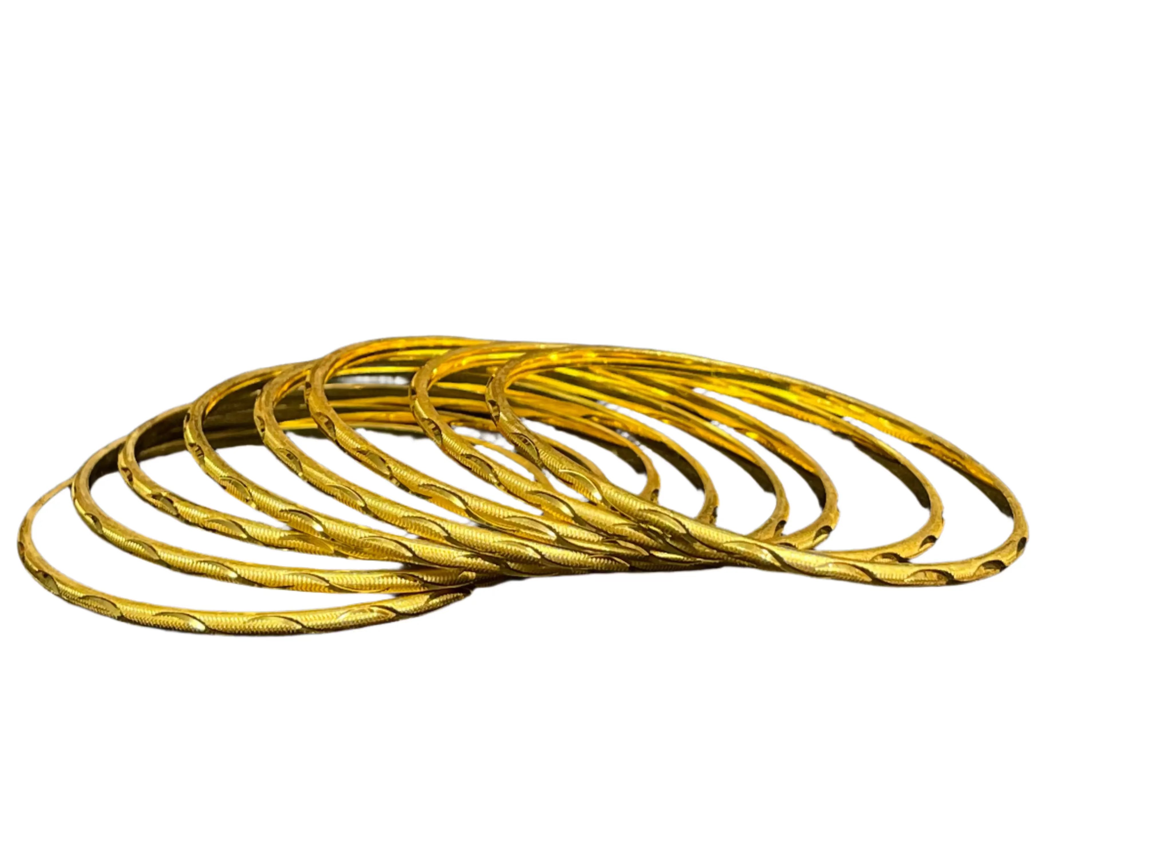 Qamar Thin Bangles Set of 8 in imitated gold by Palestinian Elegance with intricate texture design