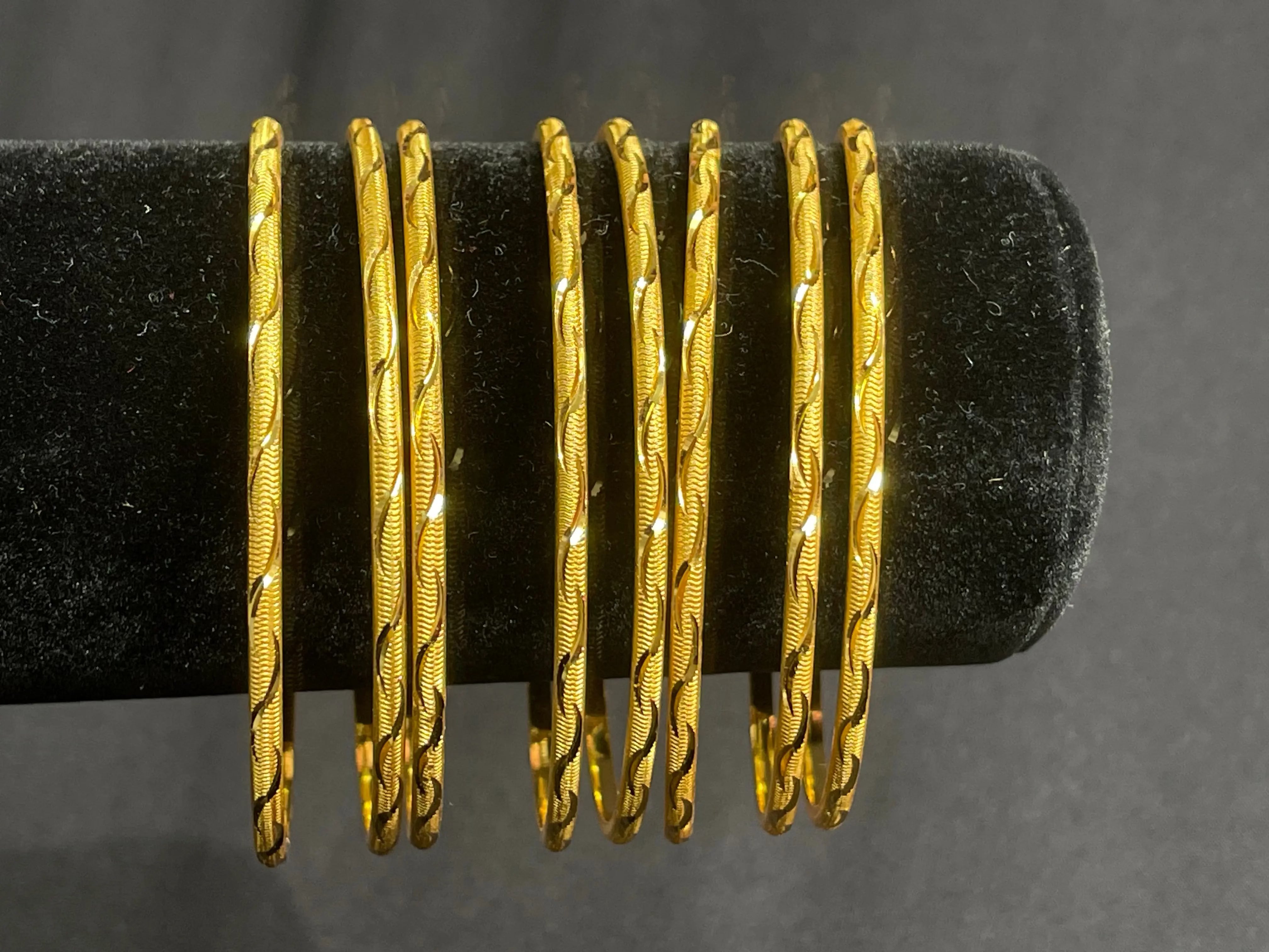 Qamar Thin Bangles Set of 8 in imitated gold from Palestinian Elegance with intricate design