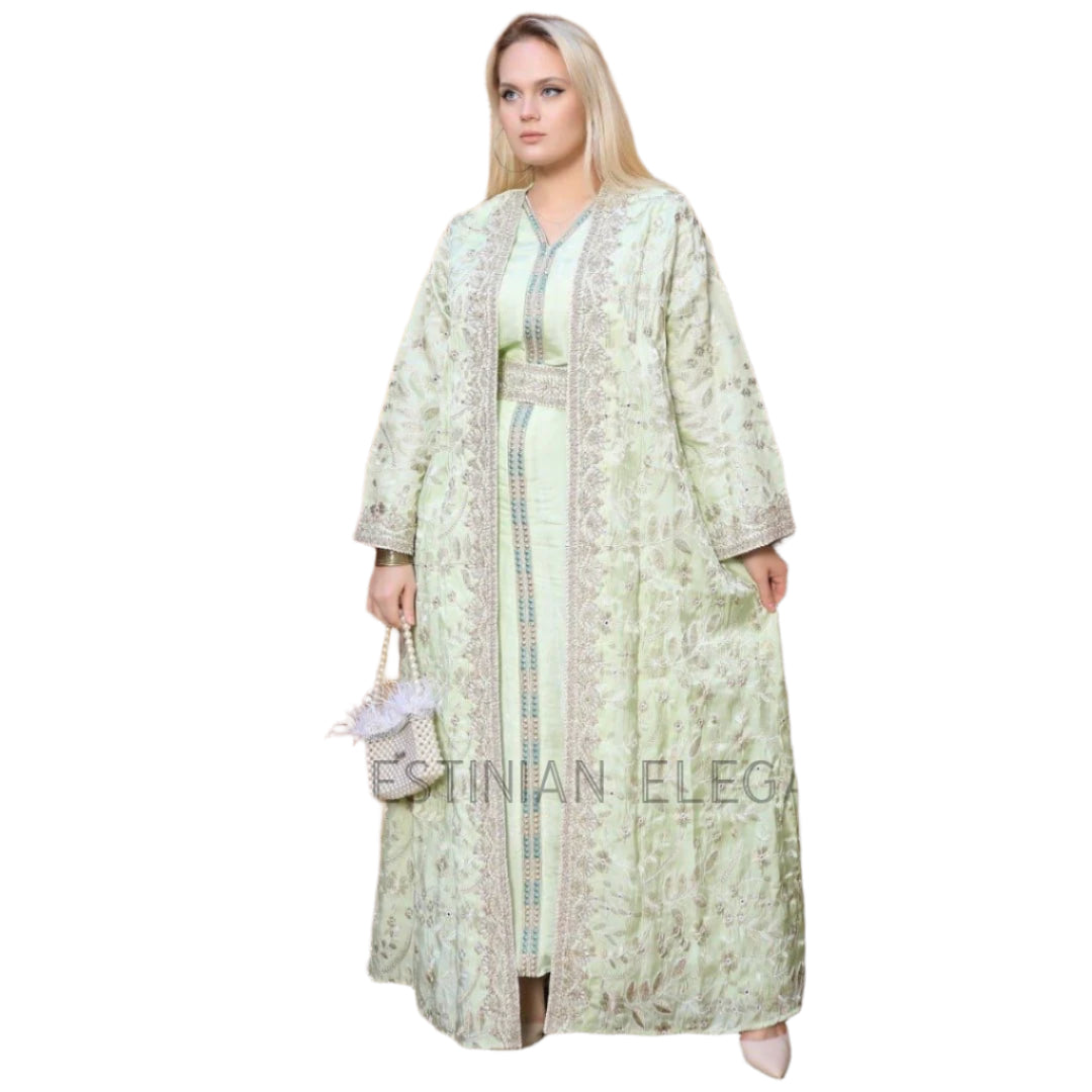 Palestinian Elegance embroidered kaftan set in light green with intricate floral embroidery and long sleeves