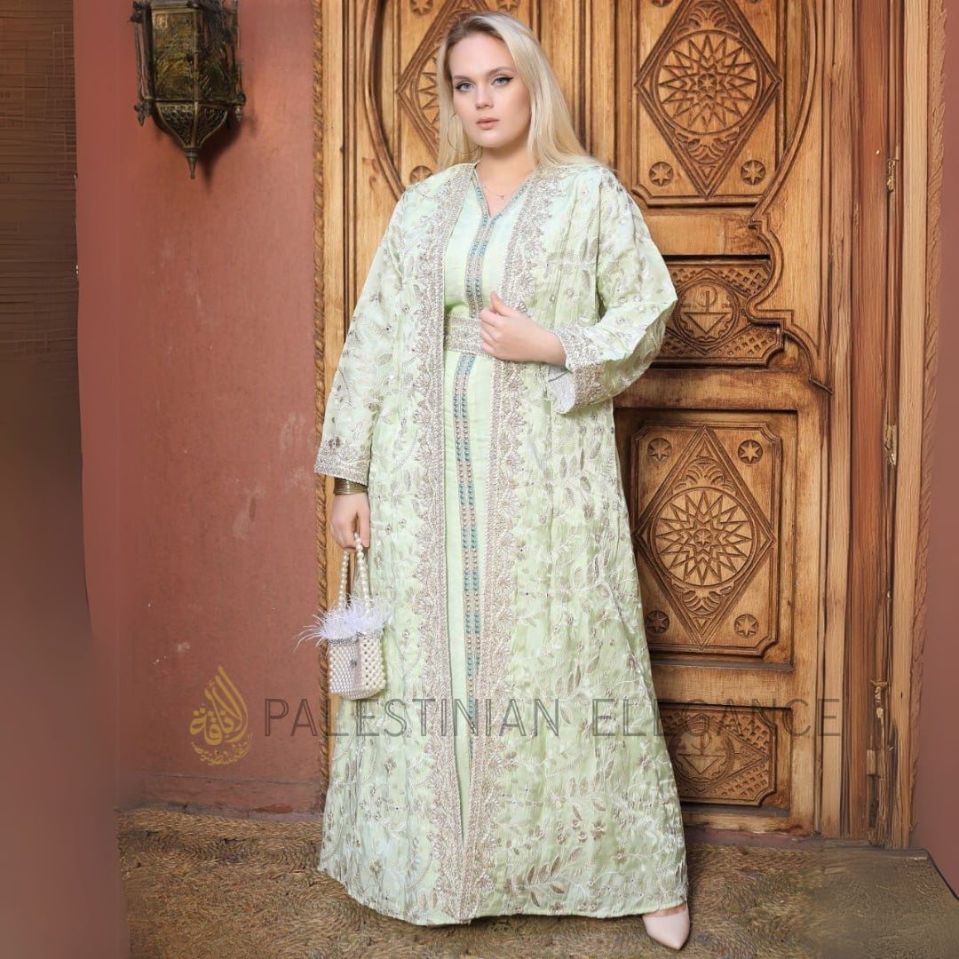 Palestinian Elegance embroidered kaftan set in light green with detailed floral embroidery and matching belt