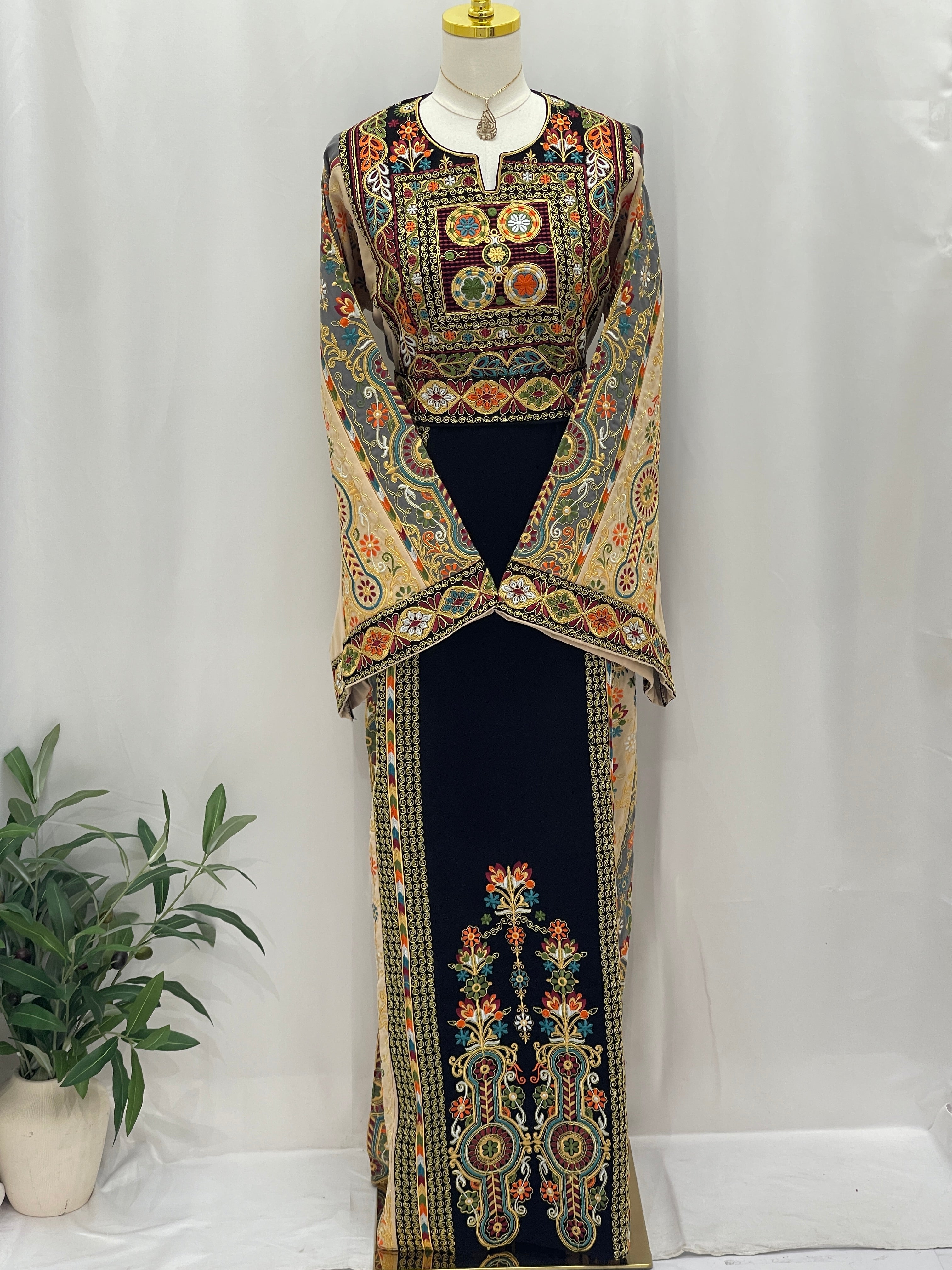 Rafif Embroidered Thobe Palestinian Elegance black thobe with vibrant multicolor chest panel and long embroidered sleeves
