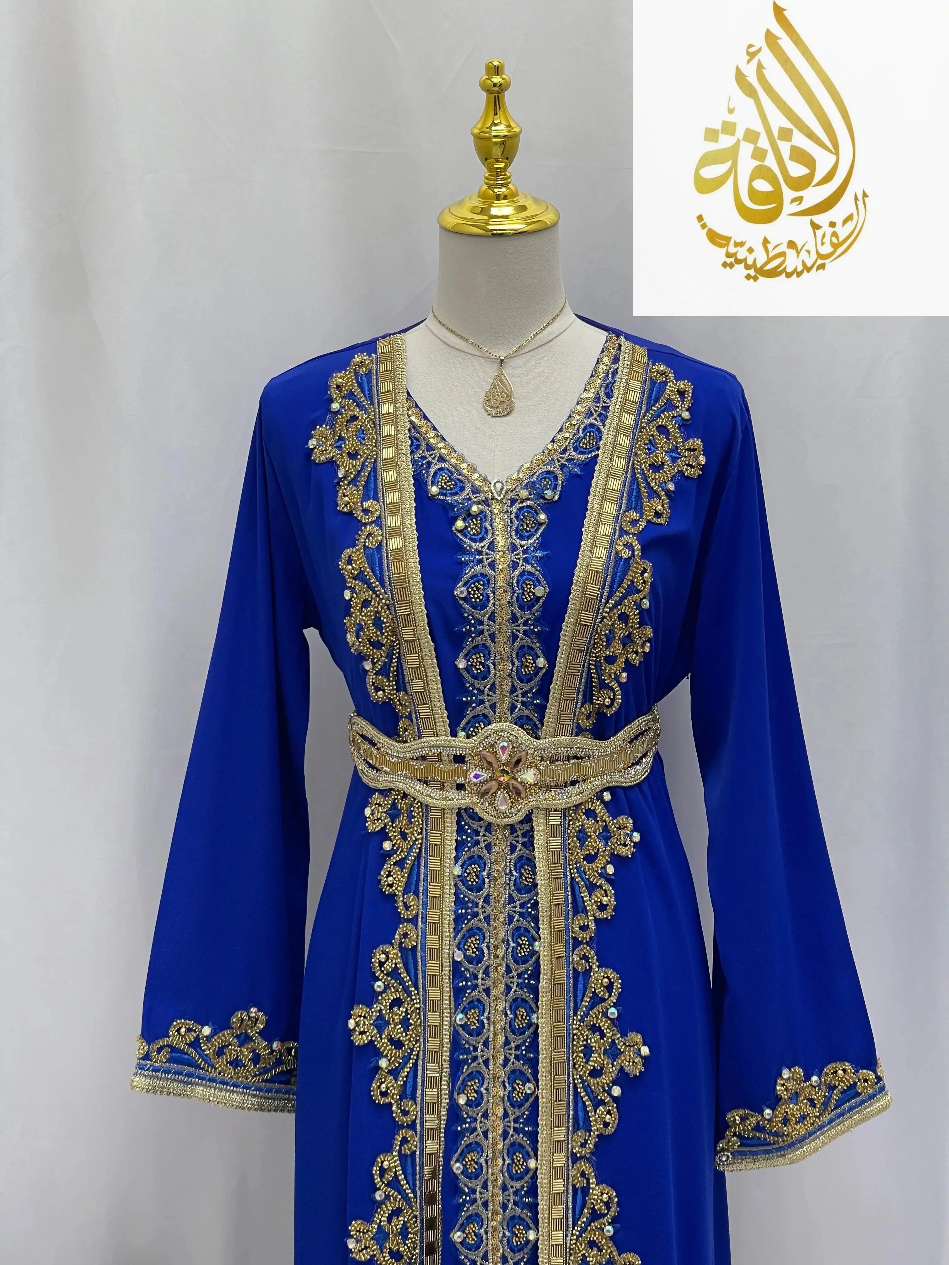 Rahaf Moroccan Style Kaftan in royal blue with intricate gold embroidery and matching belt by Palestinian Elegance