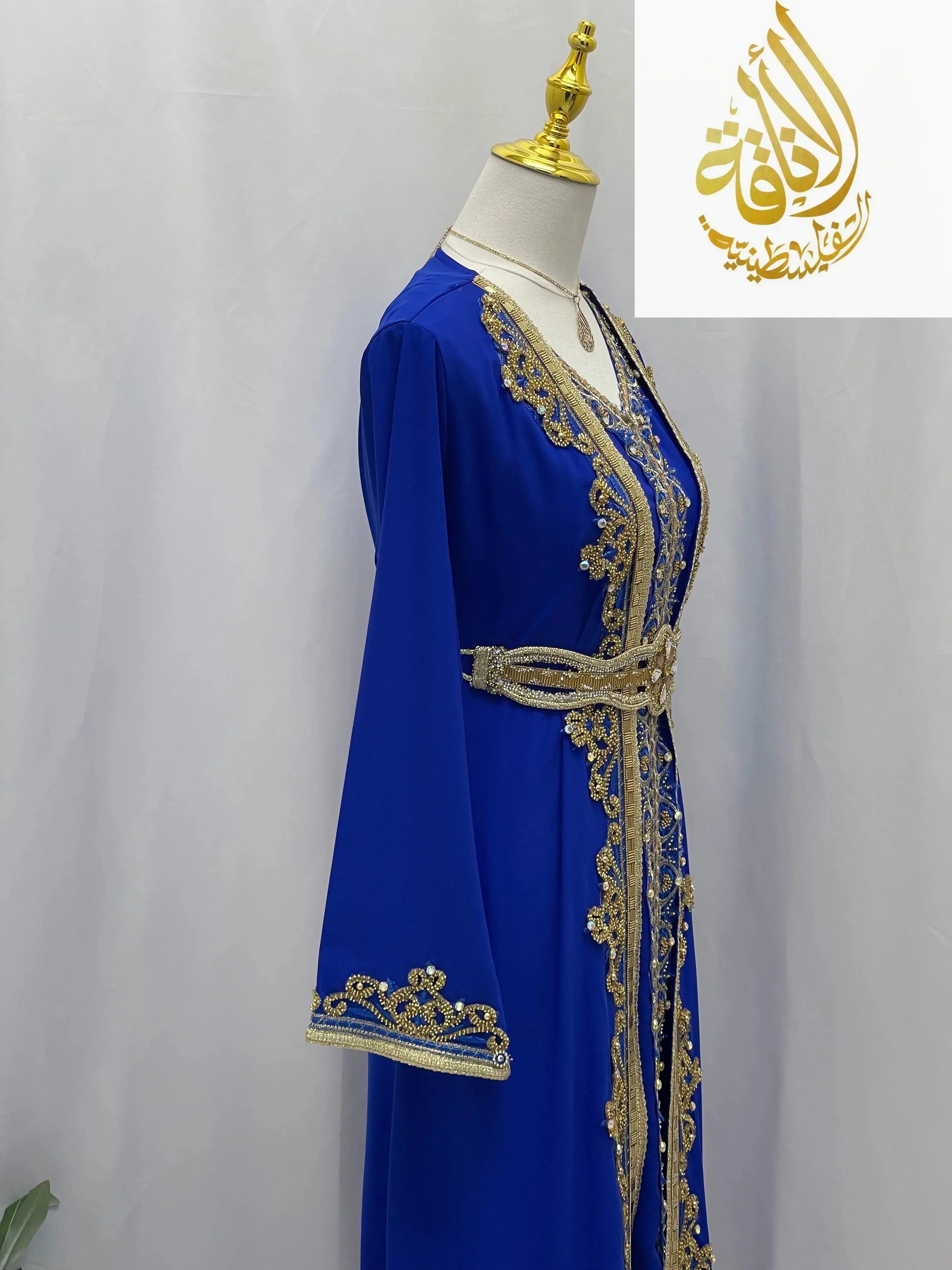 Rahaf Moroccan Style Kaftan by Palestinian Elegance in royal blue with gold embroidery and belt