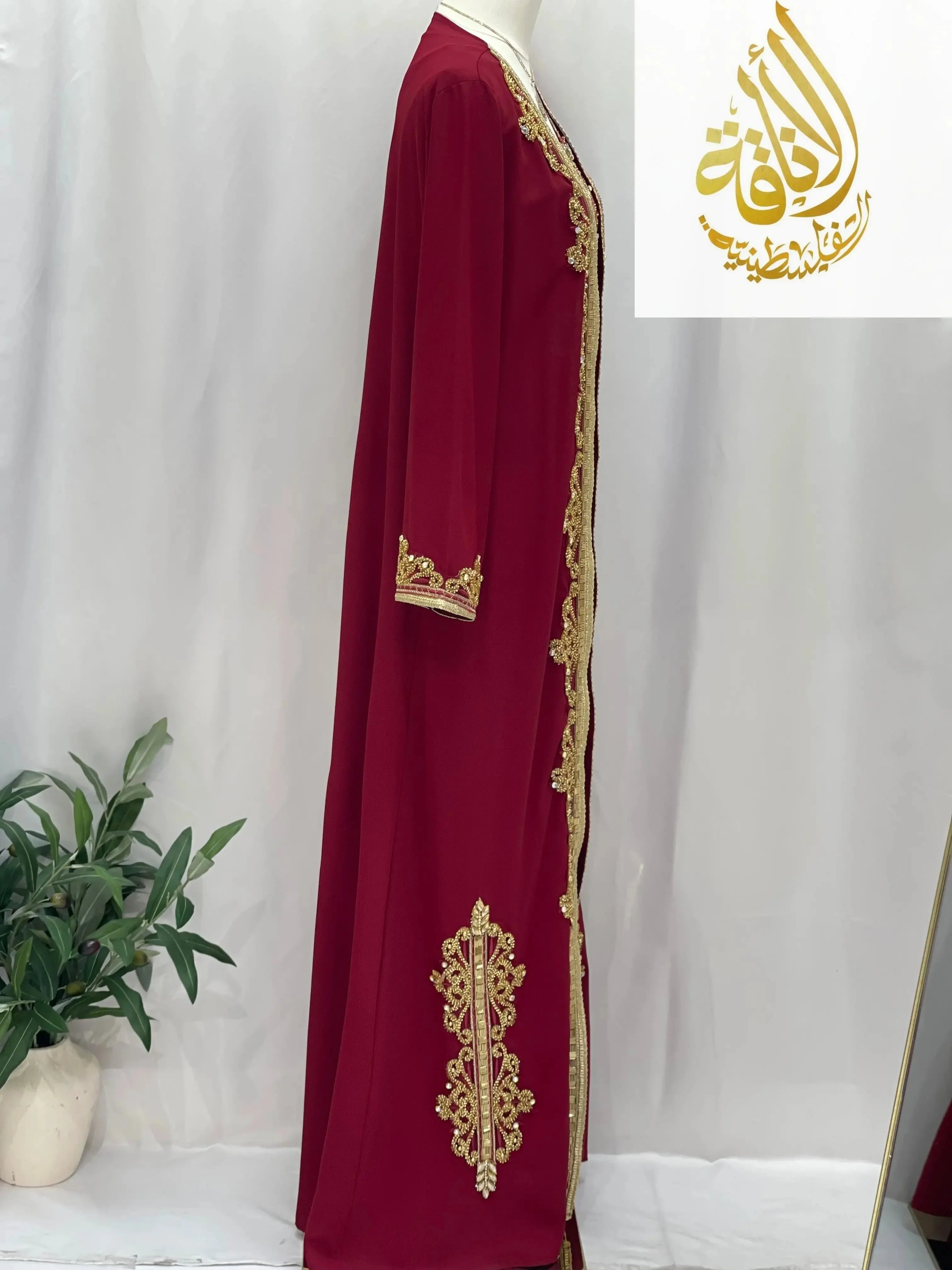 Palestinian Elegance Rahaf Moroccan Style Kaftan in burgundy with gold embroidery details