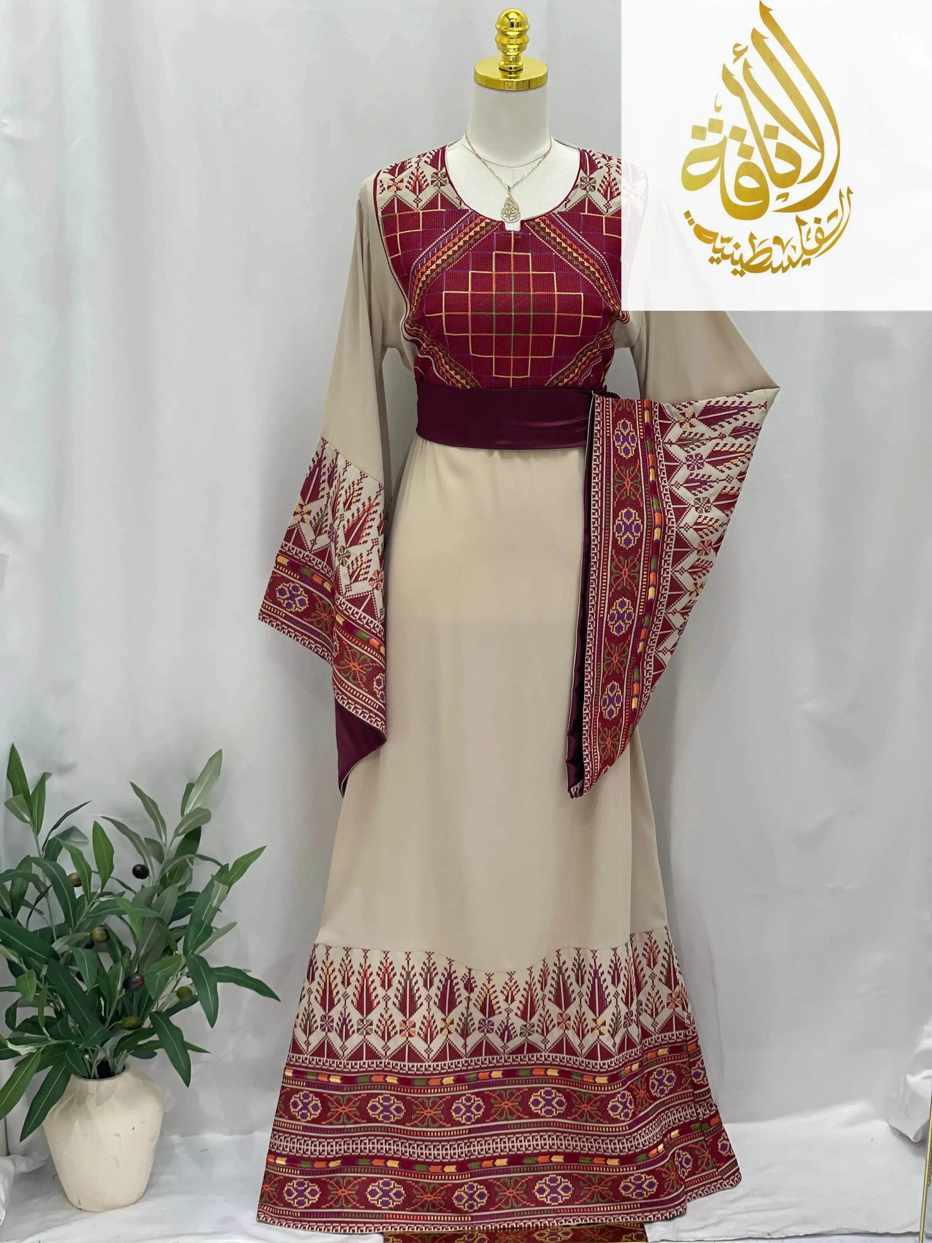 Randa Embroidered Thoub beige and burgundy traditional embroidered thobe by Palestinian Elegance