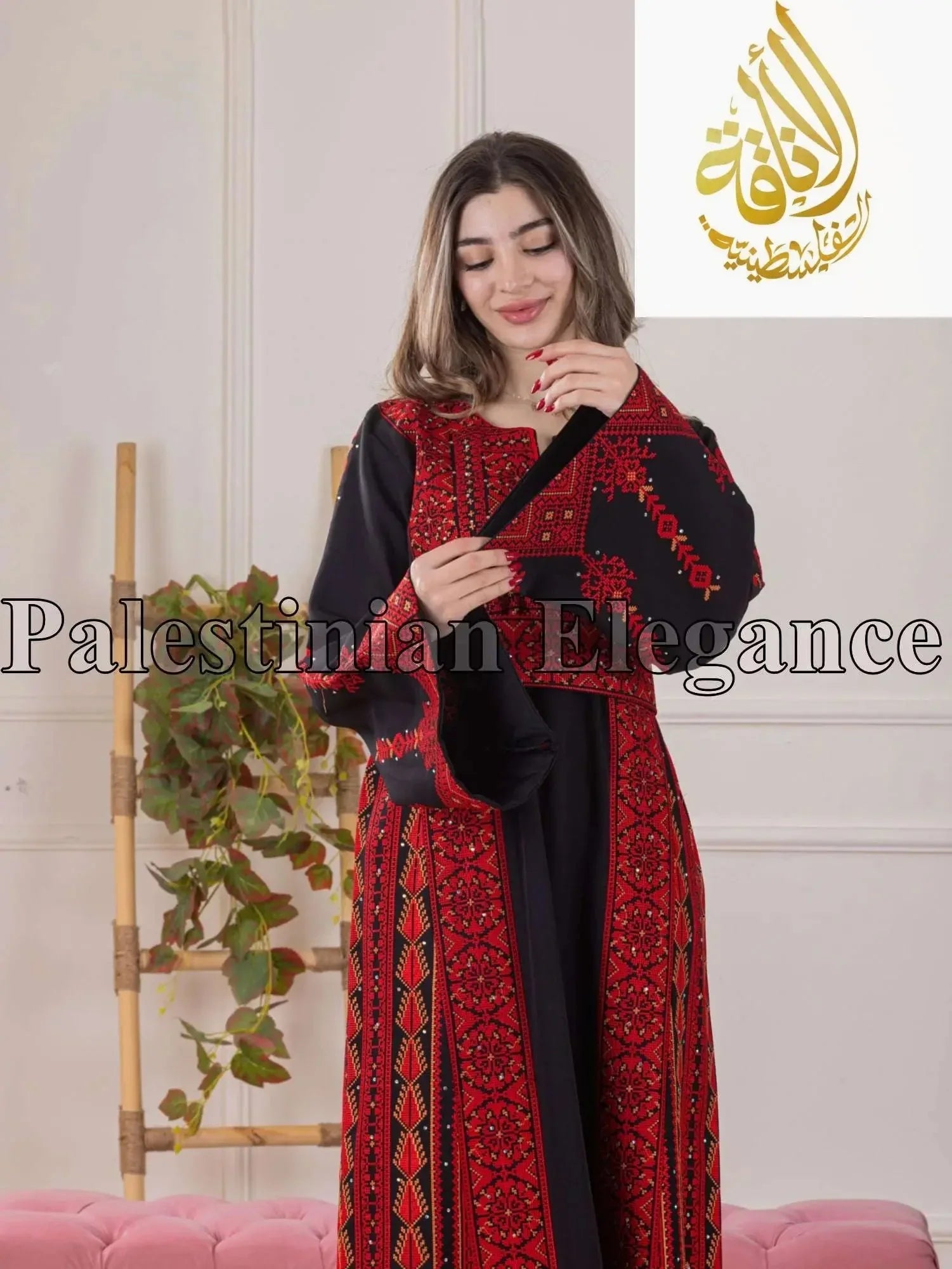 Woman wearing a Rome Embroidered Thoub in black with intricate red traditional embroidery by Palestinian Elegance