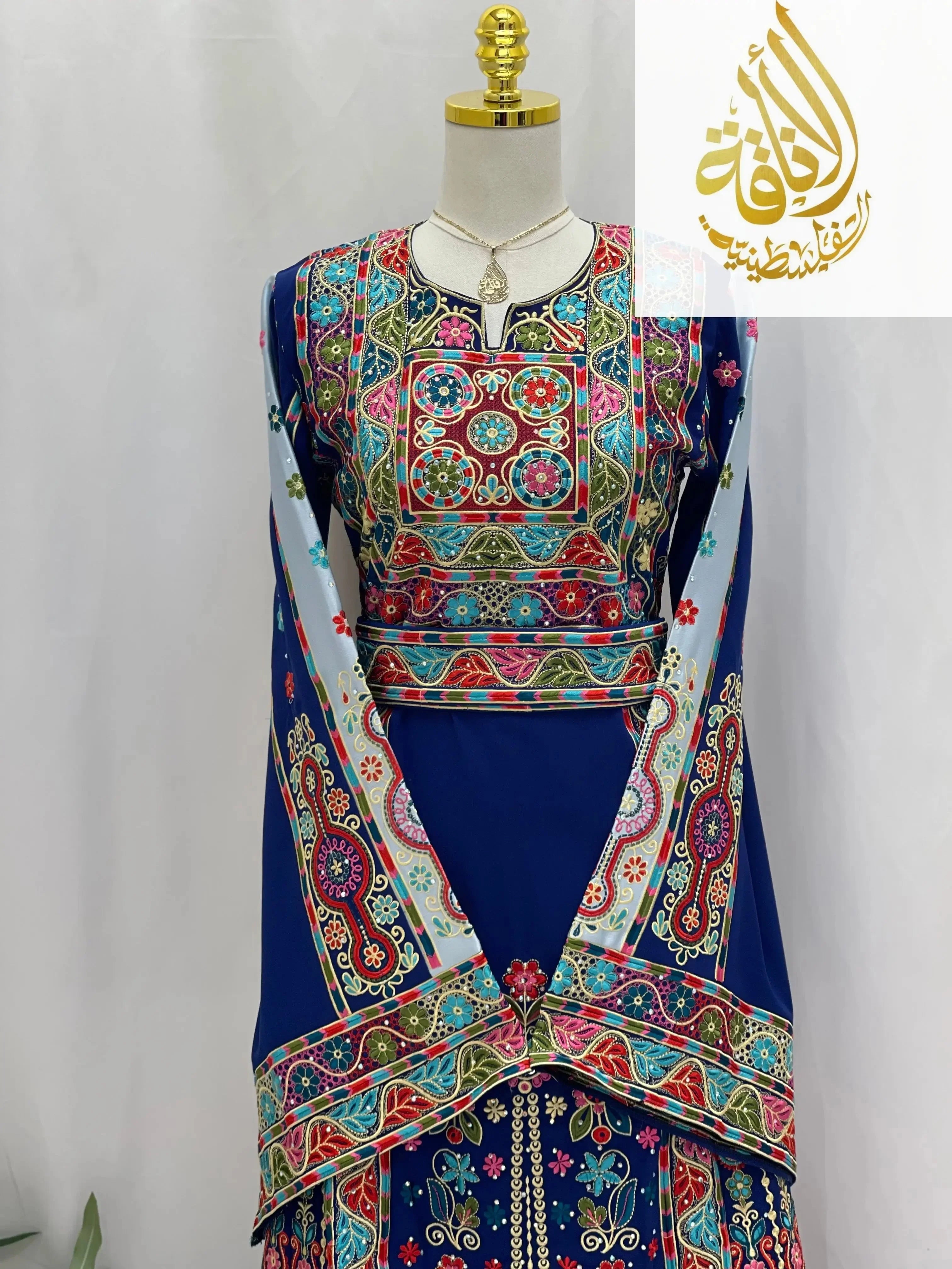 Palestinian Elegance royal blue embroidered thoub with colorful intricate embroidery and traditional patterns