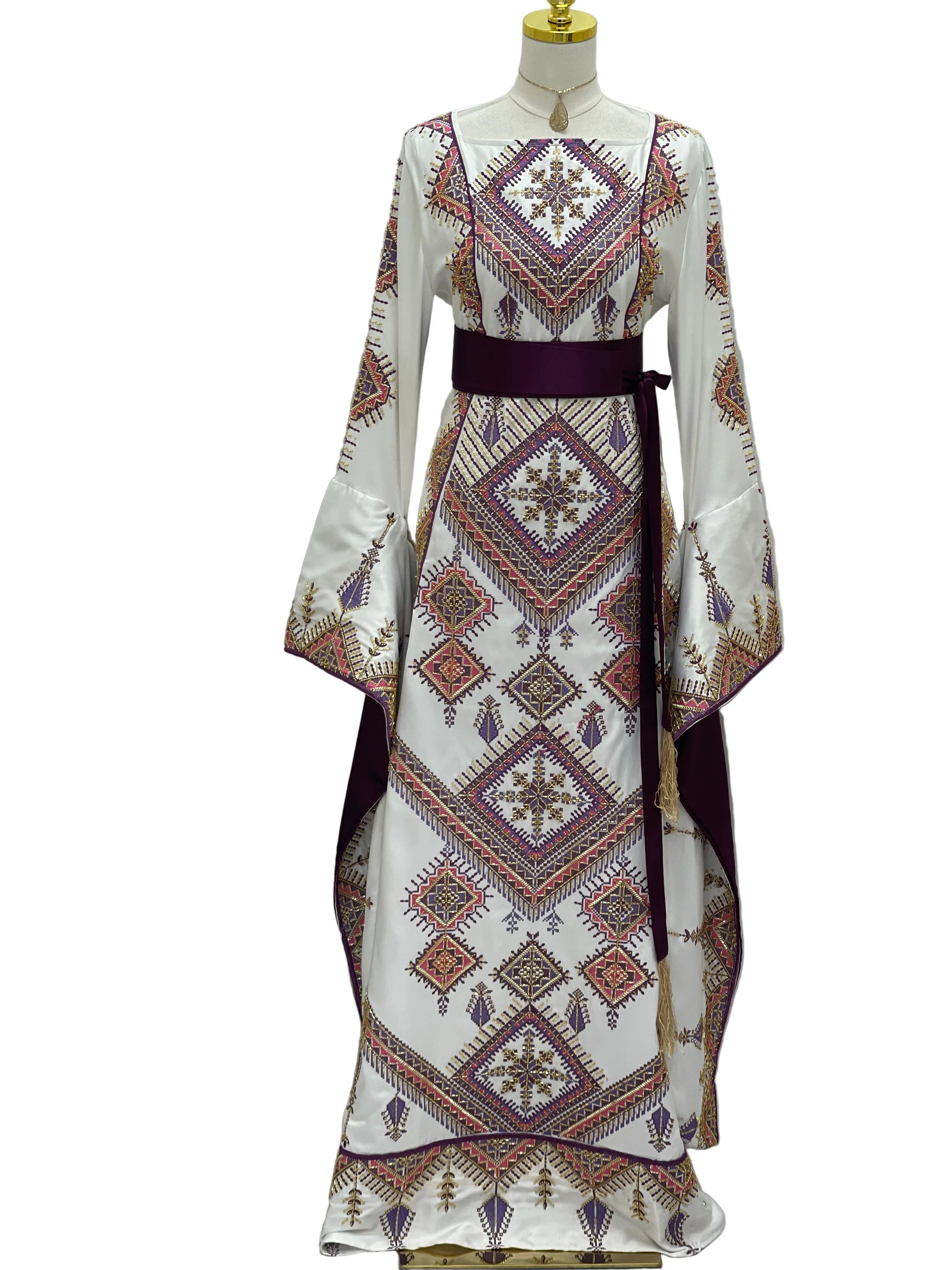 Palestinian Elegance Embroidered Thoub Gown white bridal dress with geometric embroidery purple sash and bell sleeves