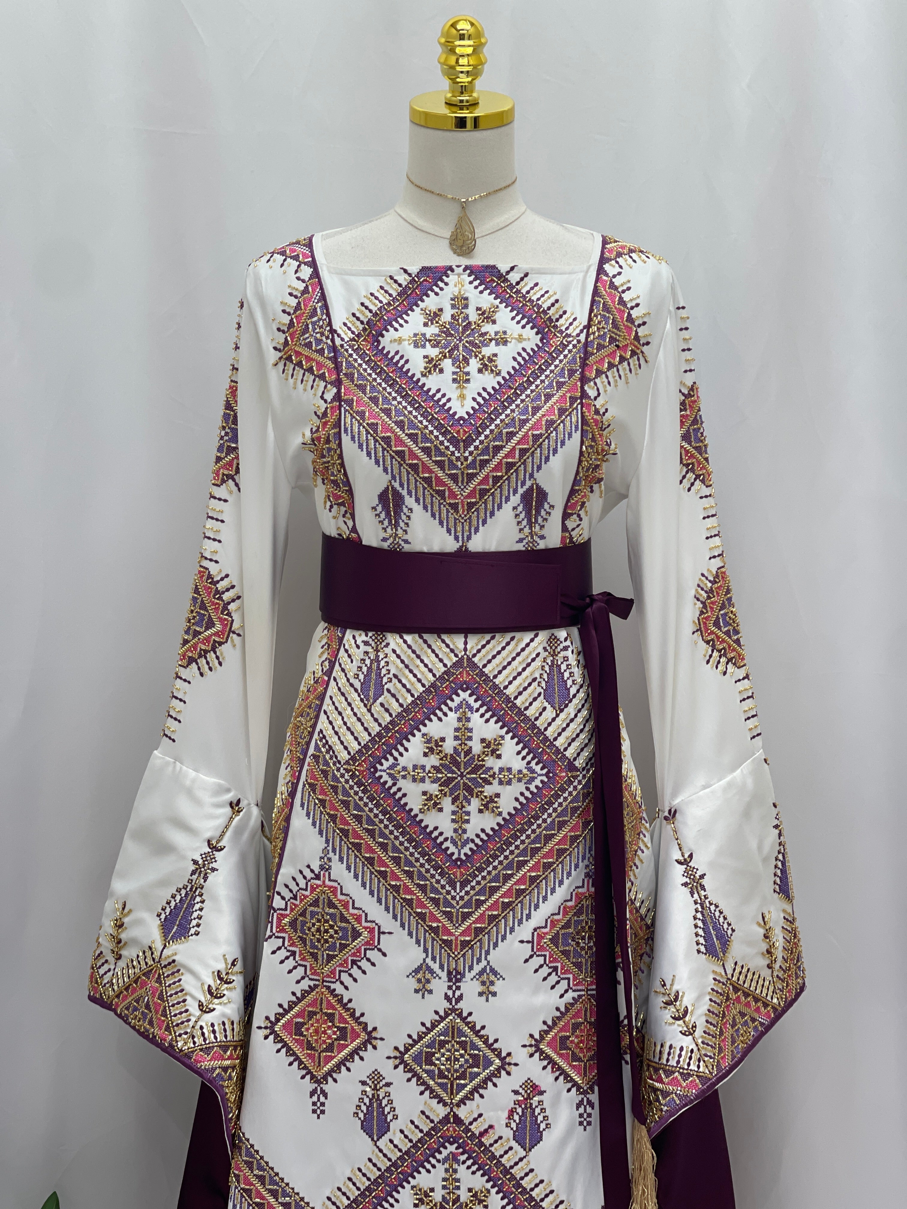 Palestinian Elegance Embroidered Thoub Gown white bridal dress with geometric embroidery and purple sash