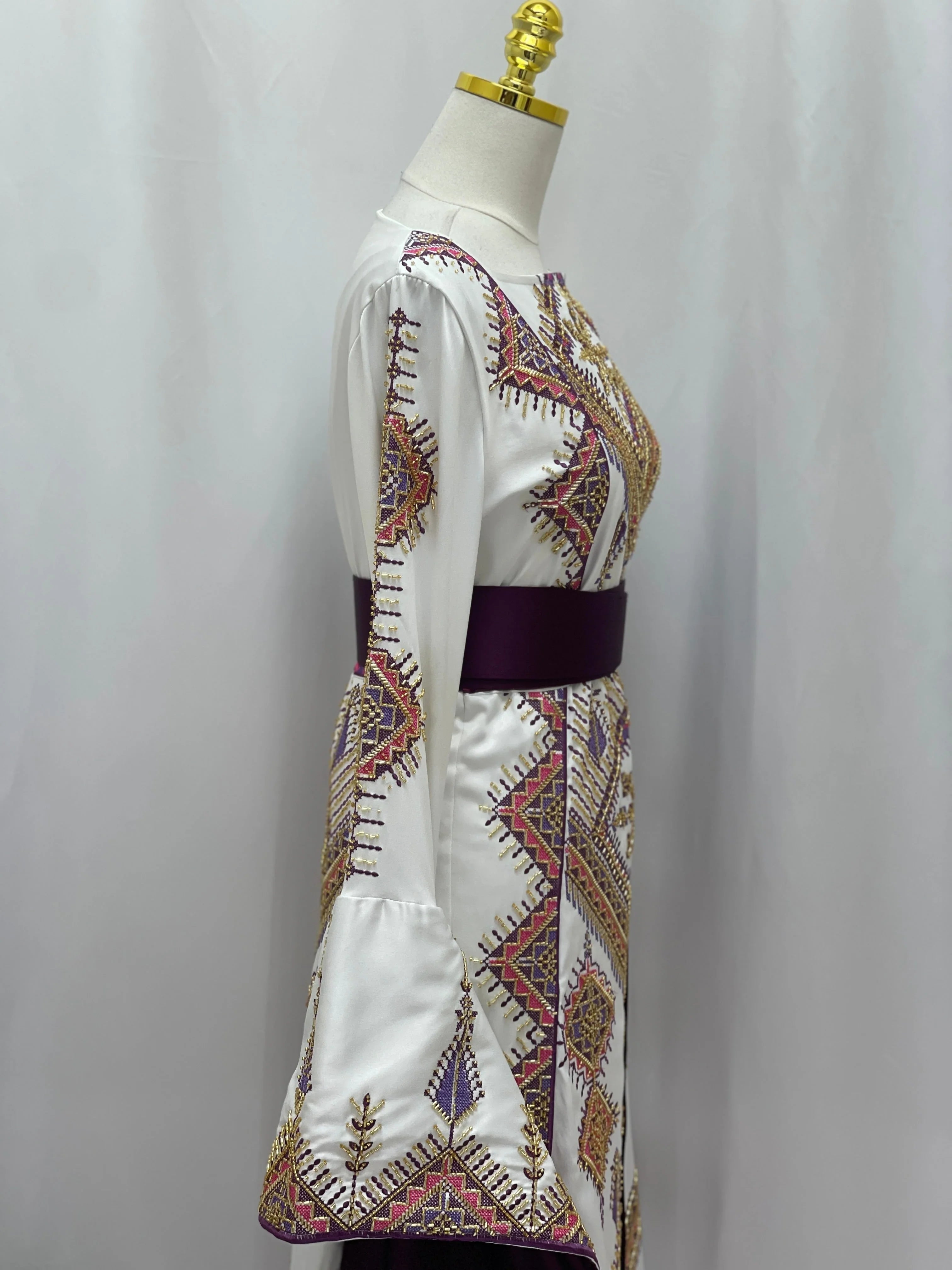 Palestinian Elegance bridal Embroidered Thoub Gown white satin with traditional Palestinian embroidery and purple waist sash
