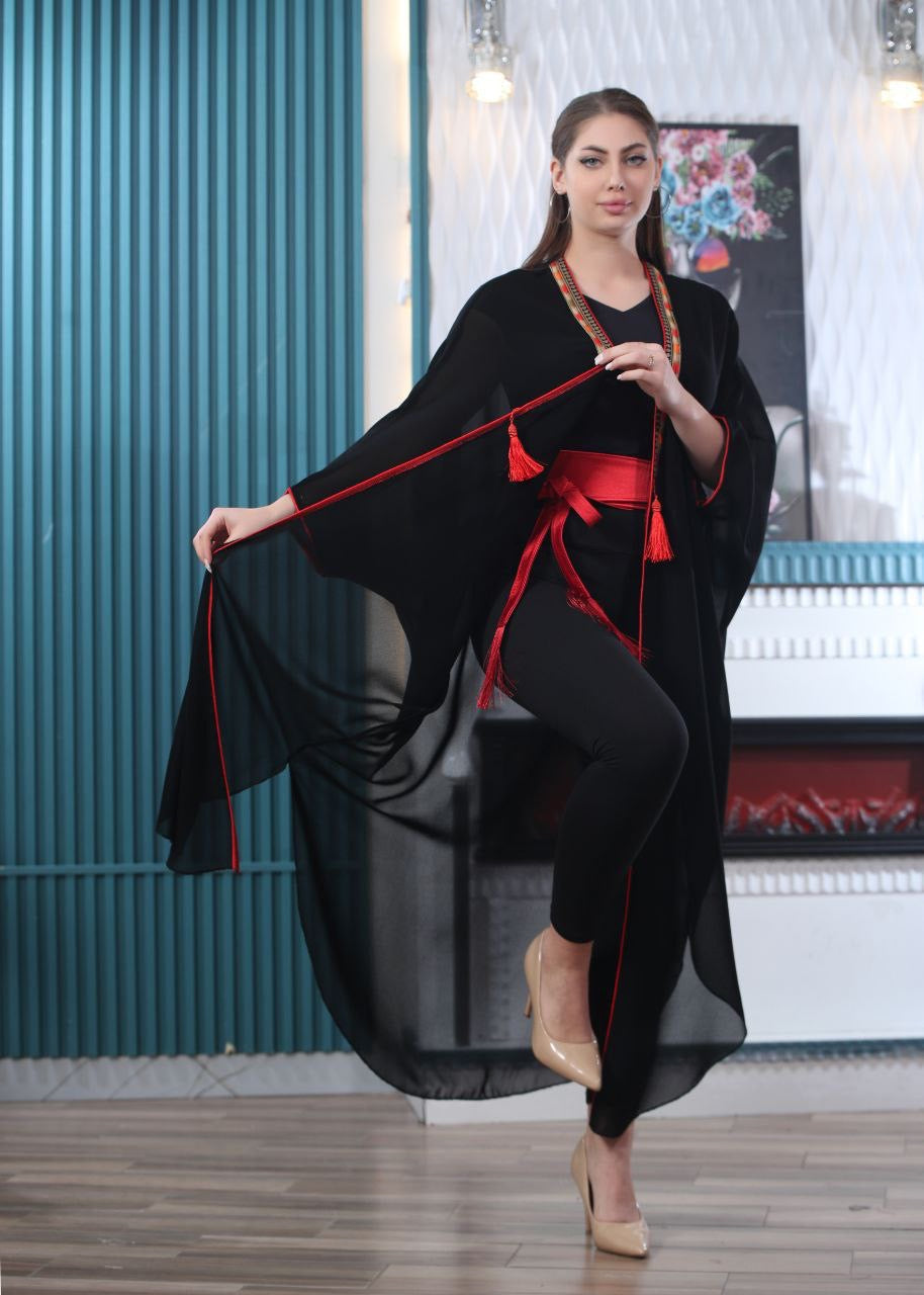 Palestinian Elegance black embroidered chiffon cardigan with red tassel details and matching belt