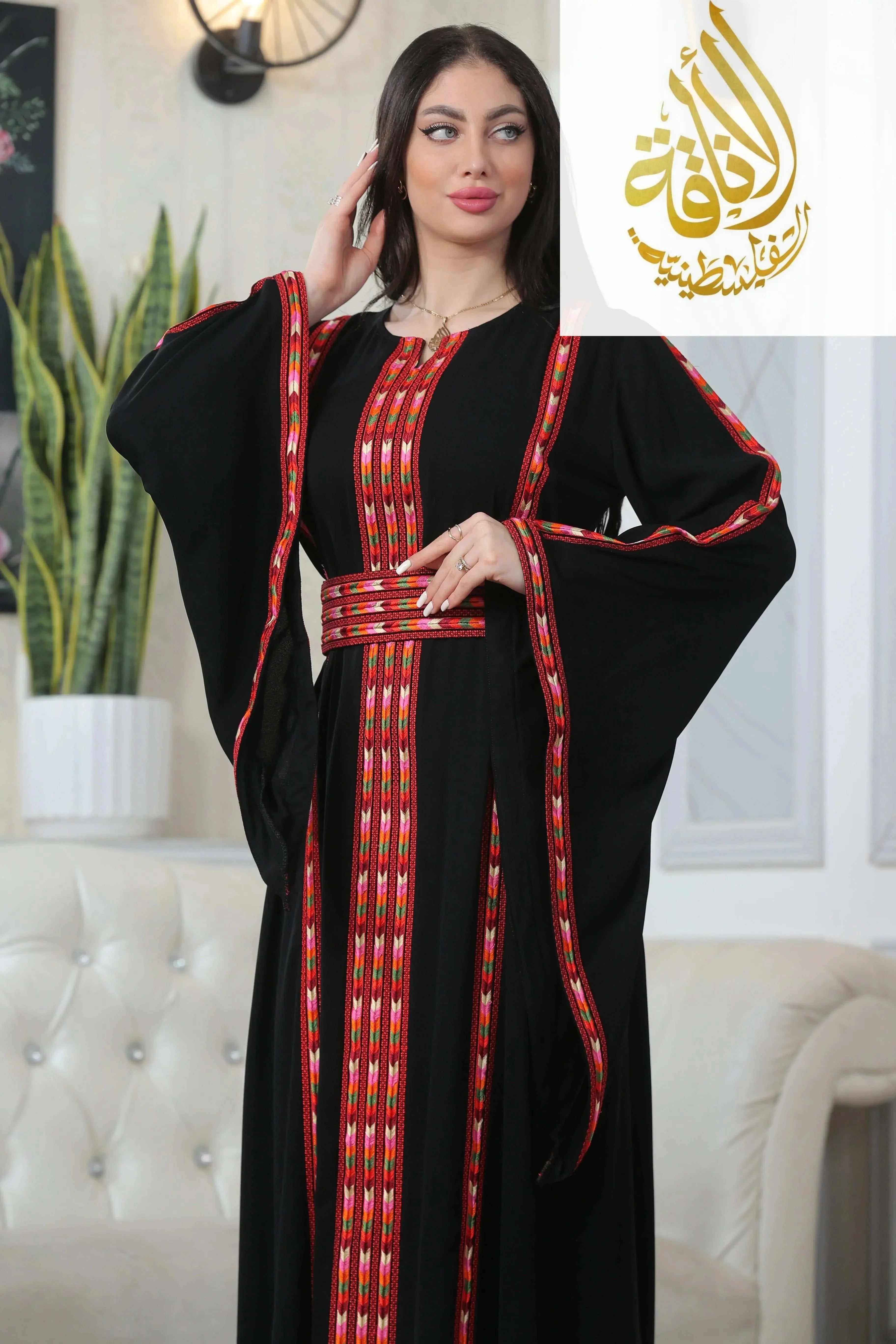 Palestinian Elegance Salam Manjal Embroidered Thoub black with red and gold detailed embroidery