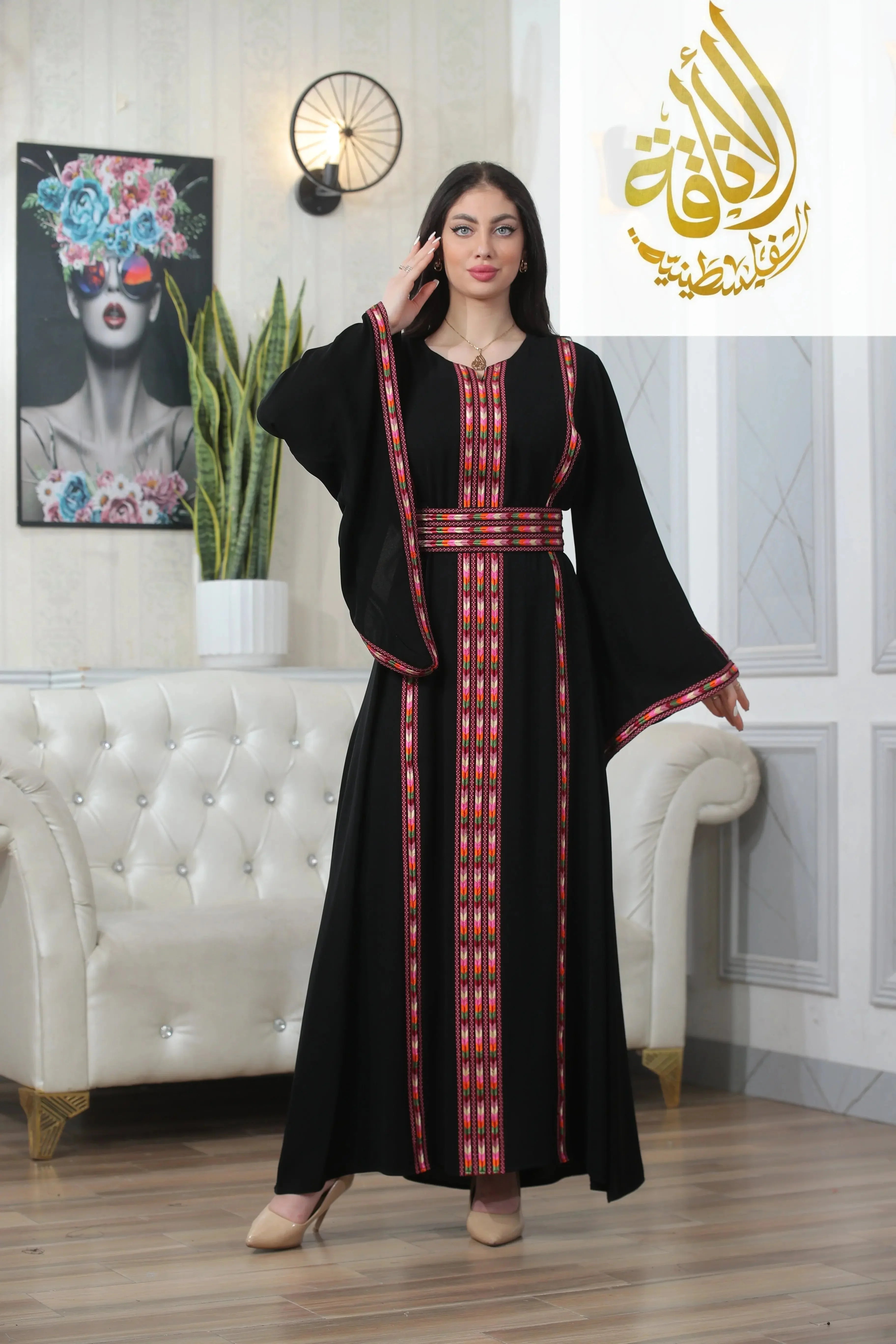 Palestinian Elegance Salam Manjal Embroidered Thoub black traditional dress with red and white embroidery