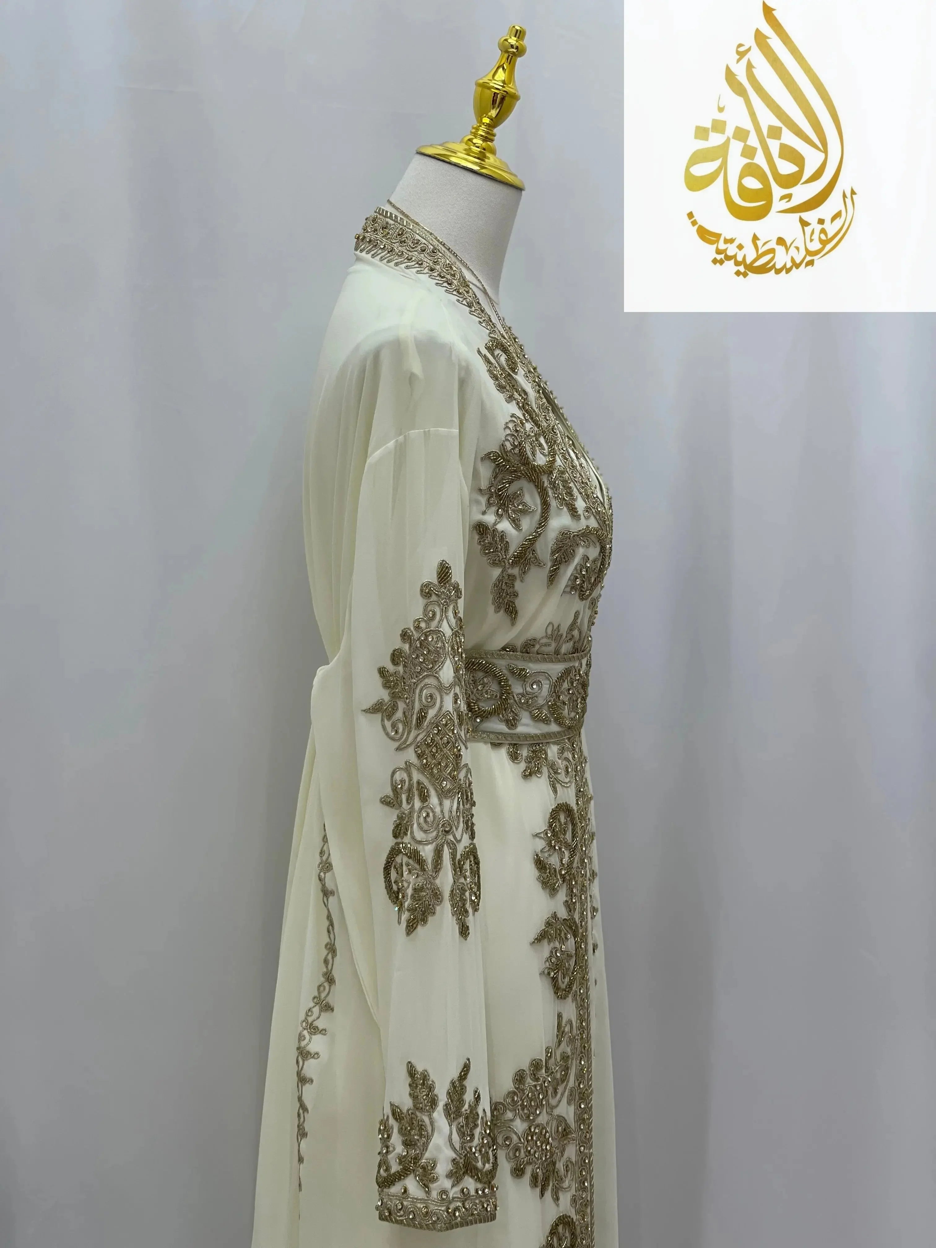 Palestinian Elegance white Moroccan Style Kaftan with intricate gold embroidery on sleeves and waist