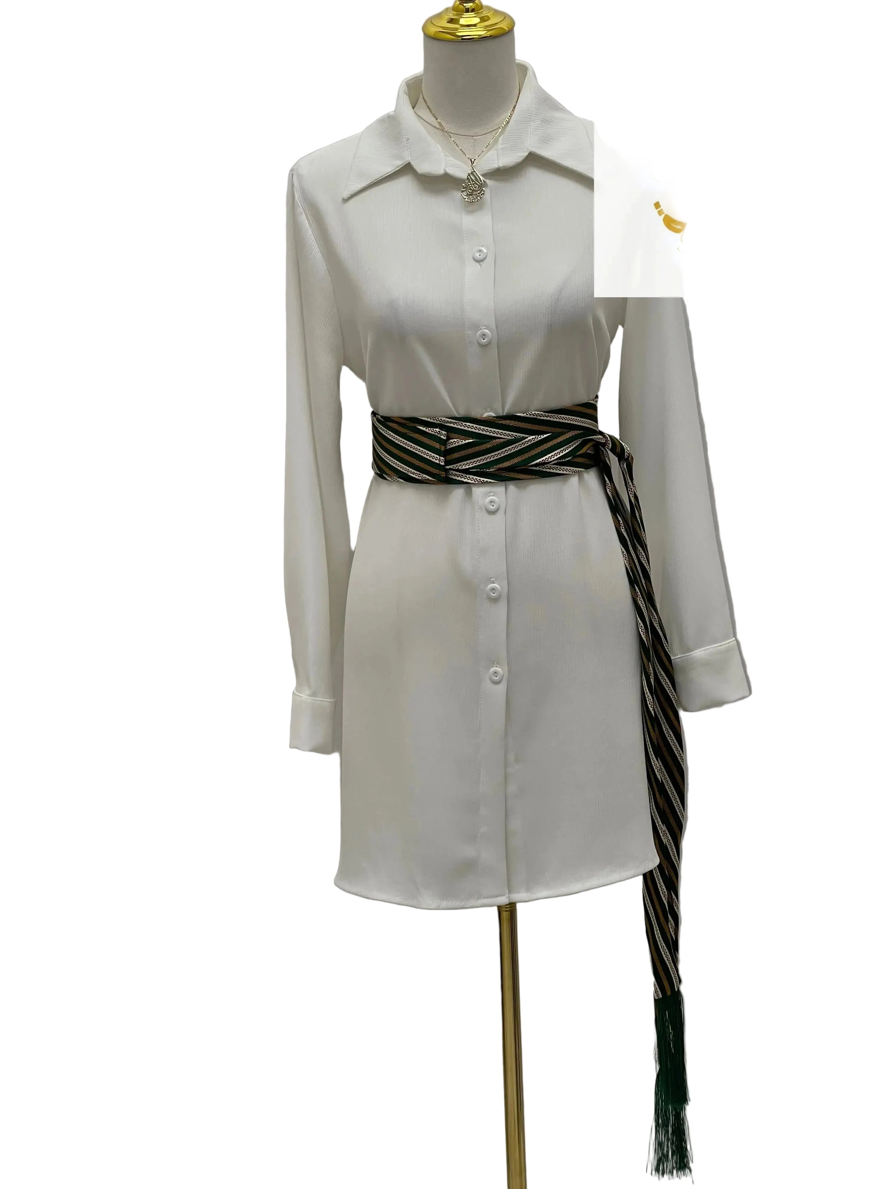 Palestinian embroidered belt with striped pattern wrapped on white button-down dress