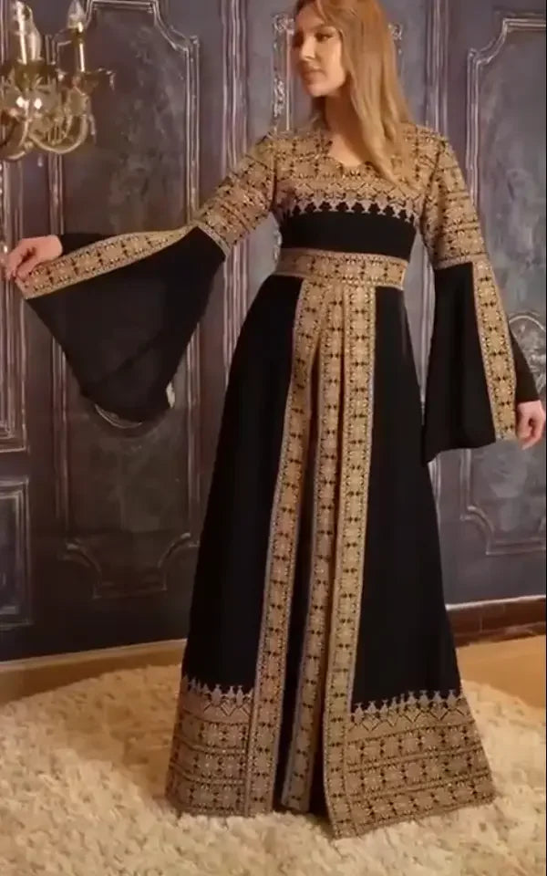Black and gold embroidered tatreez dress for women with long bell sleeves by Palestinian Elegance