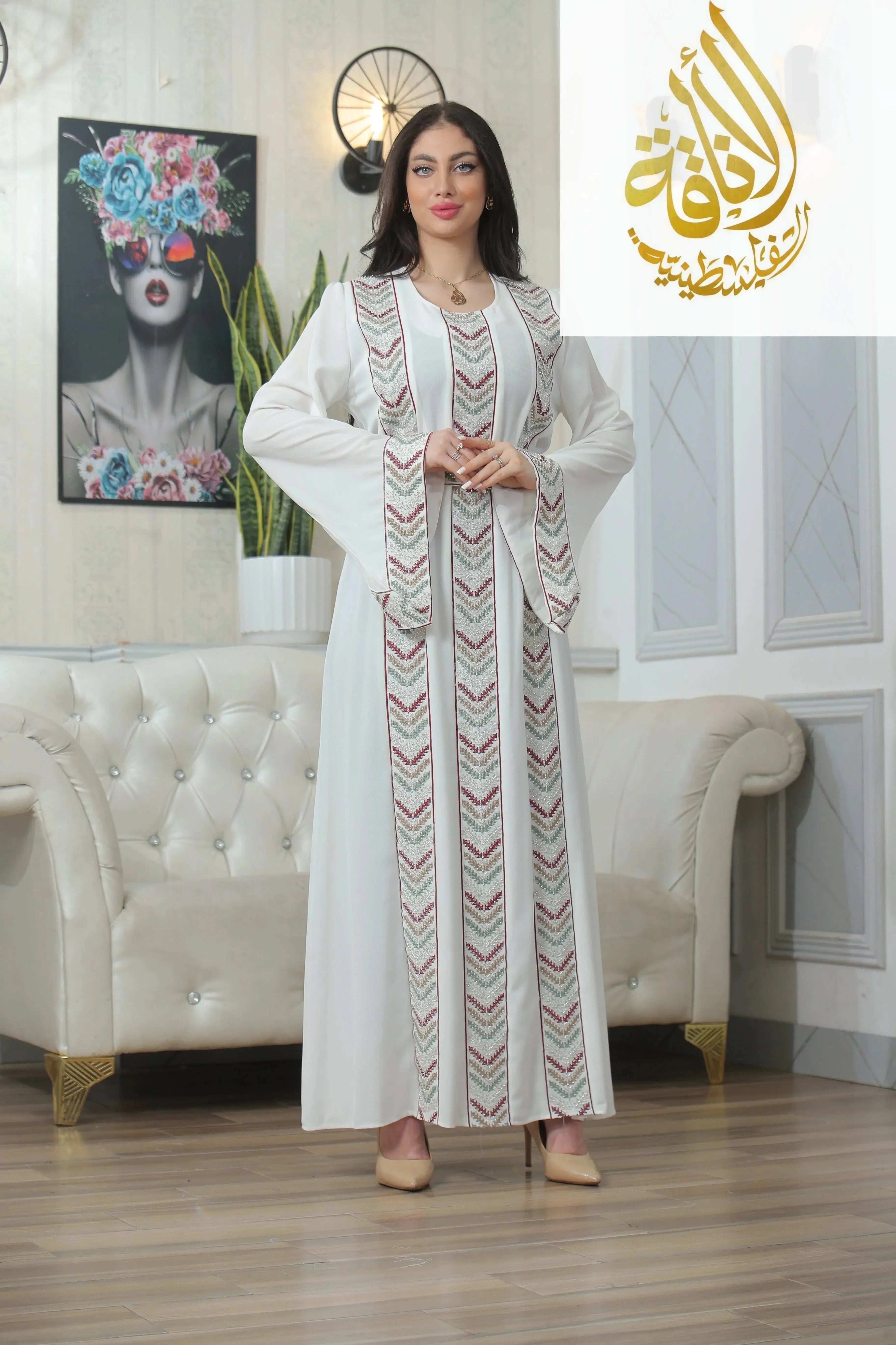 Palestinian Elegance Seham Embroidered Beads Thoub in white with intricate beadwork and elegant design