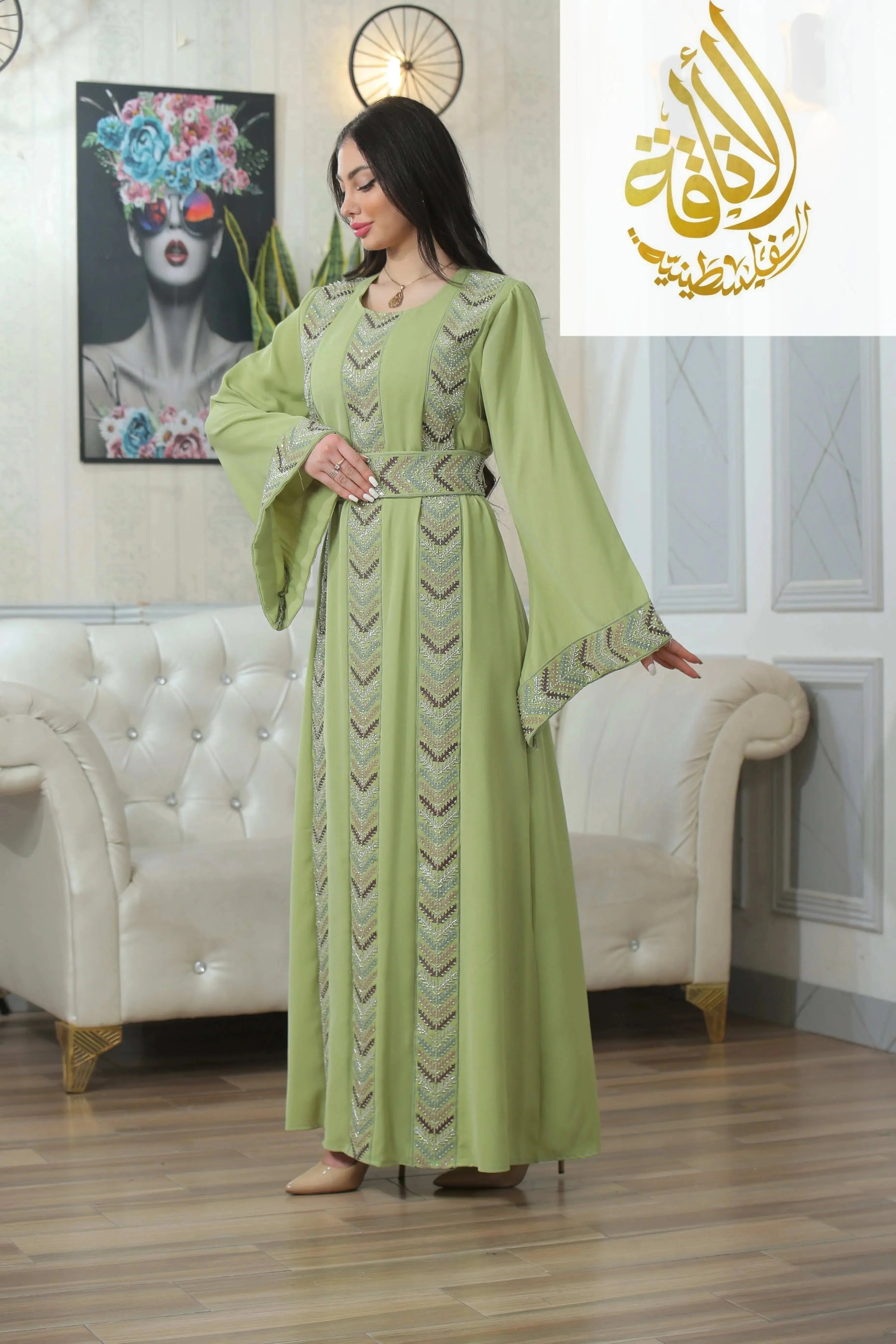 Palestinian Elegance Seham Embroidered Beads Thoub in light green with intricate beadwork and traditional long sleeves