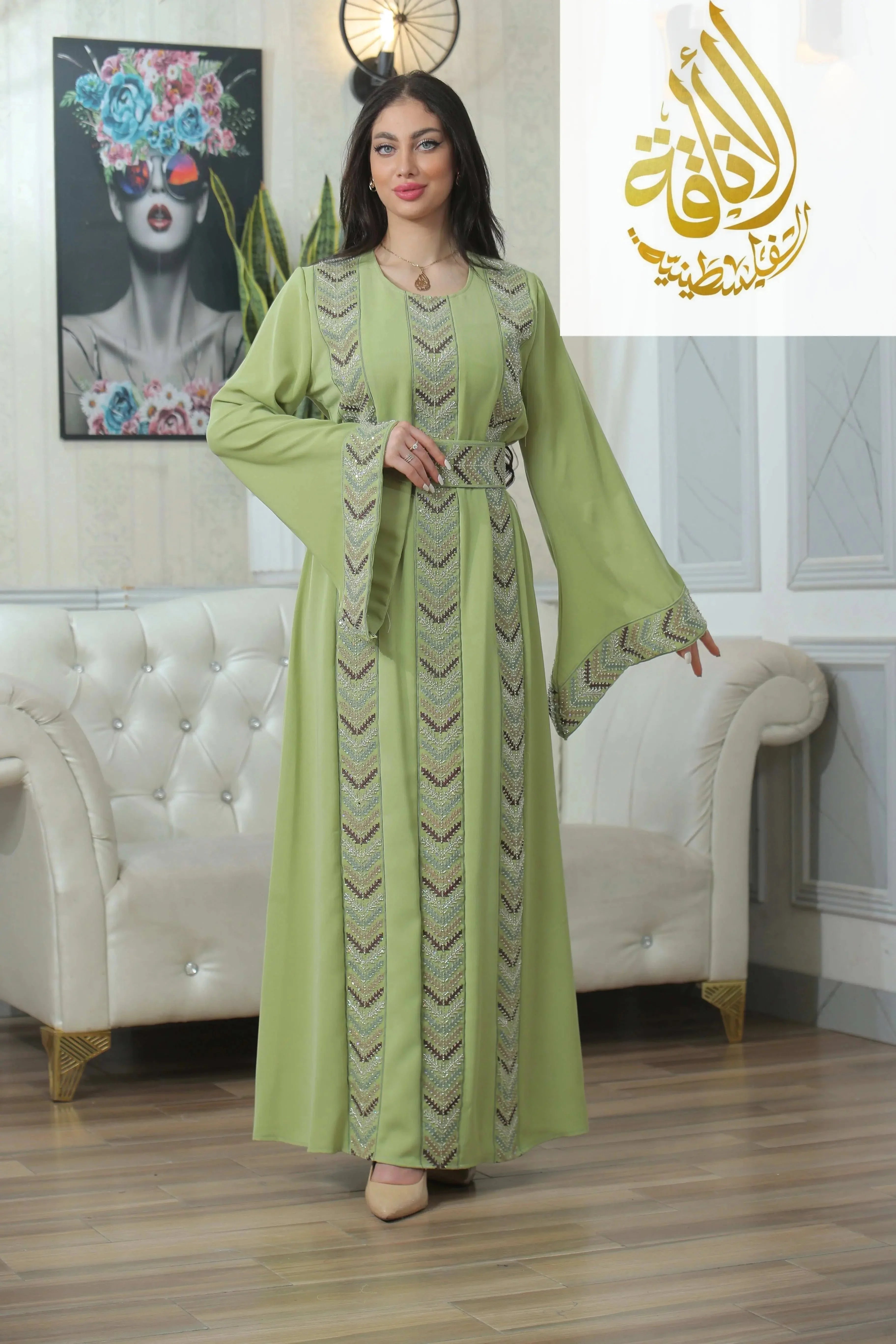 Palestinian Elegance Seham Embroidered Beads Thoub in light green with intricate bead embroidery and long sleeves