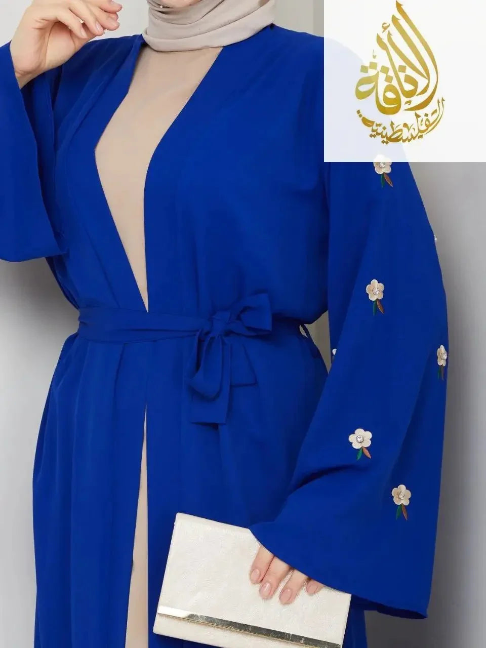 Palestinian Elegance modern abaya set in royal blue with floral embroidery and waist tie belt