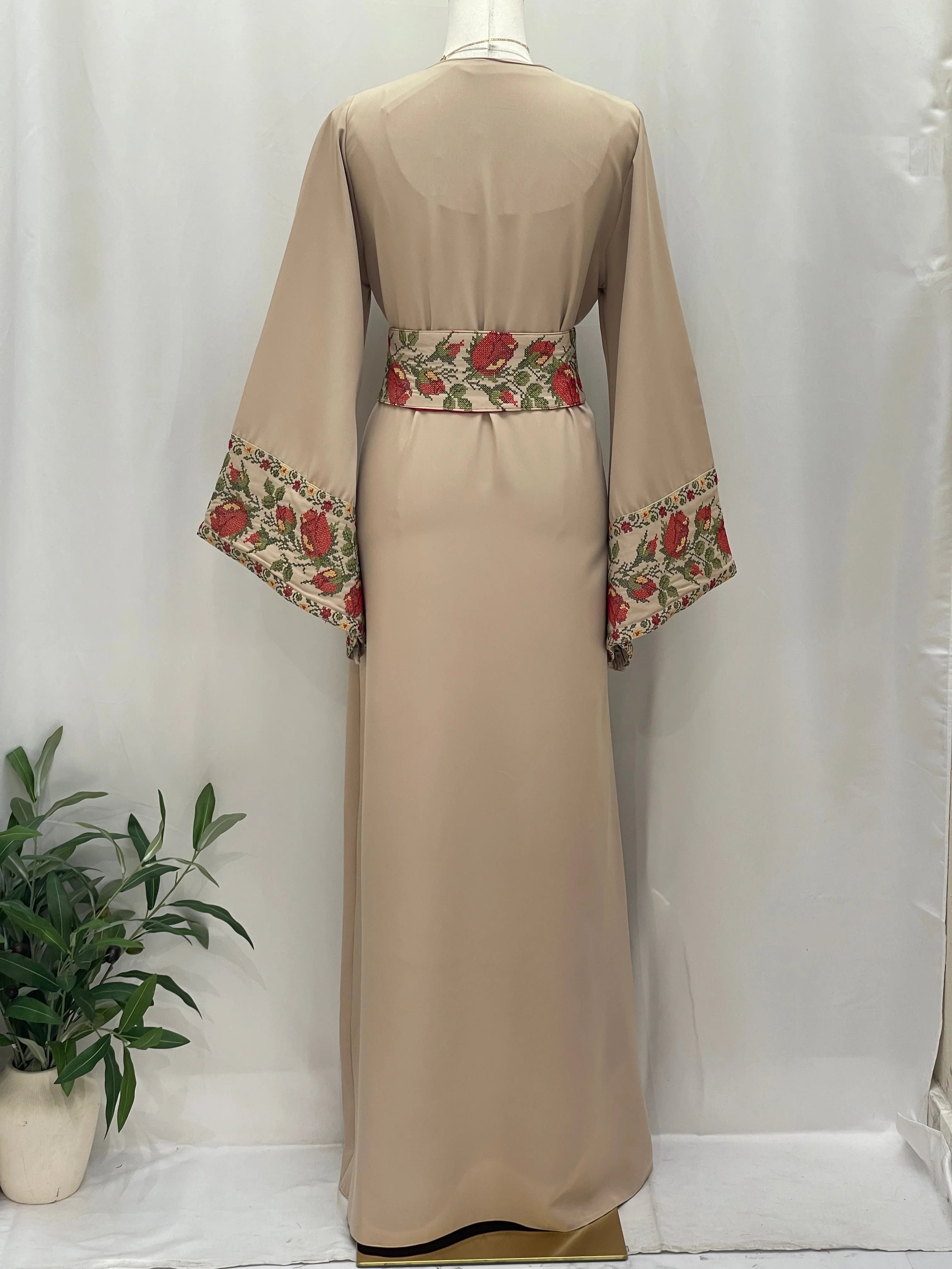 Elegant Shaqaeq Embroidered Thobe with floral detailing on sleeves and waistband