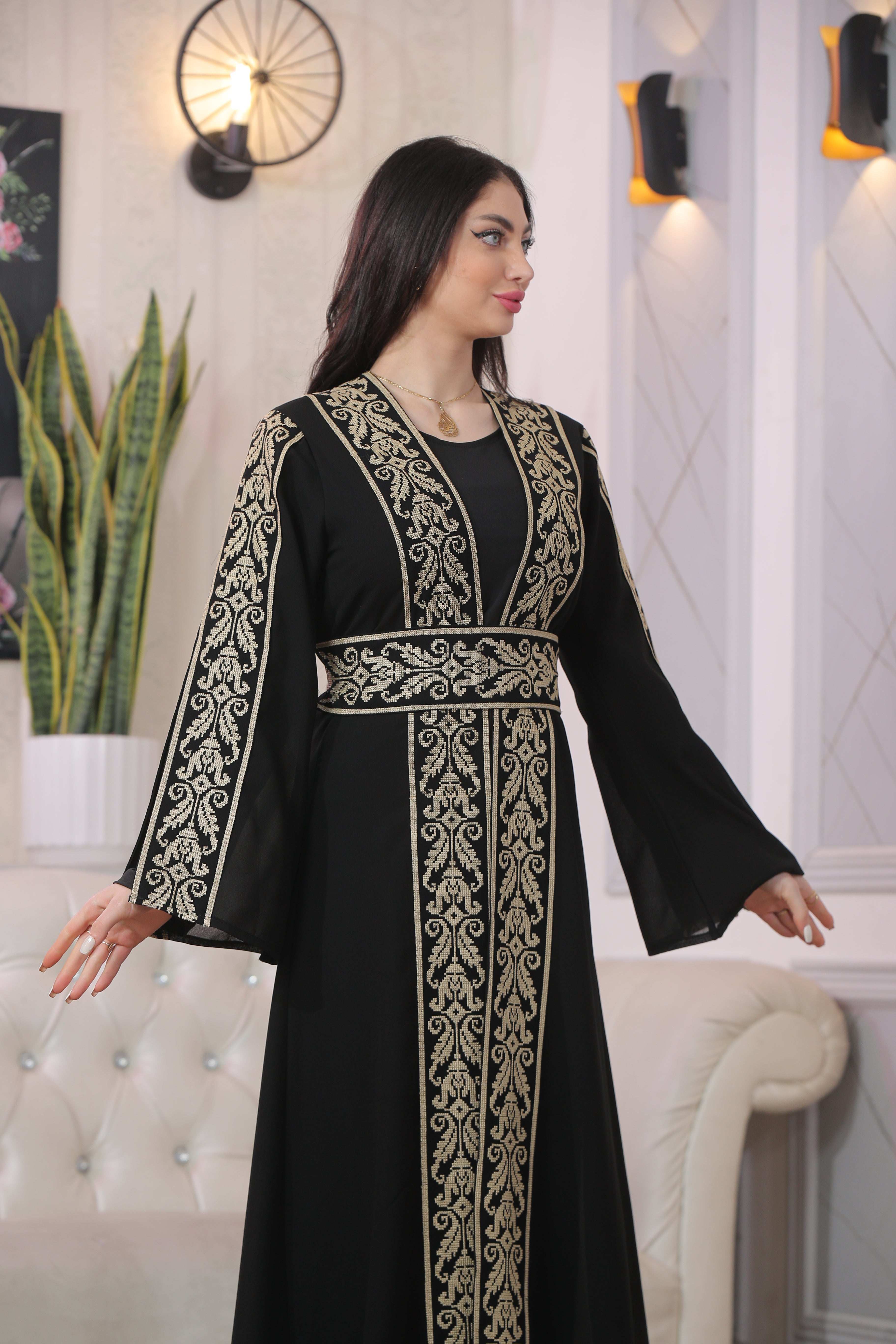Black Shereen Embroidered Bisht Abaya thoub with intricate gold embroidery on sleeves and front by Palestinian Elegance