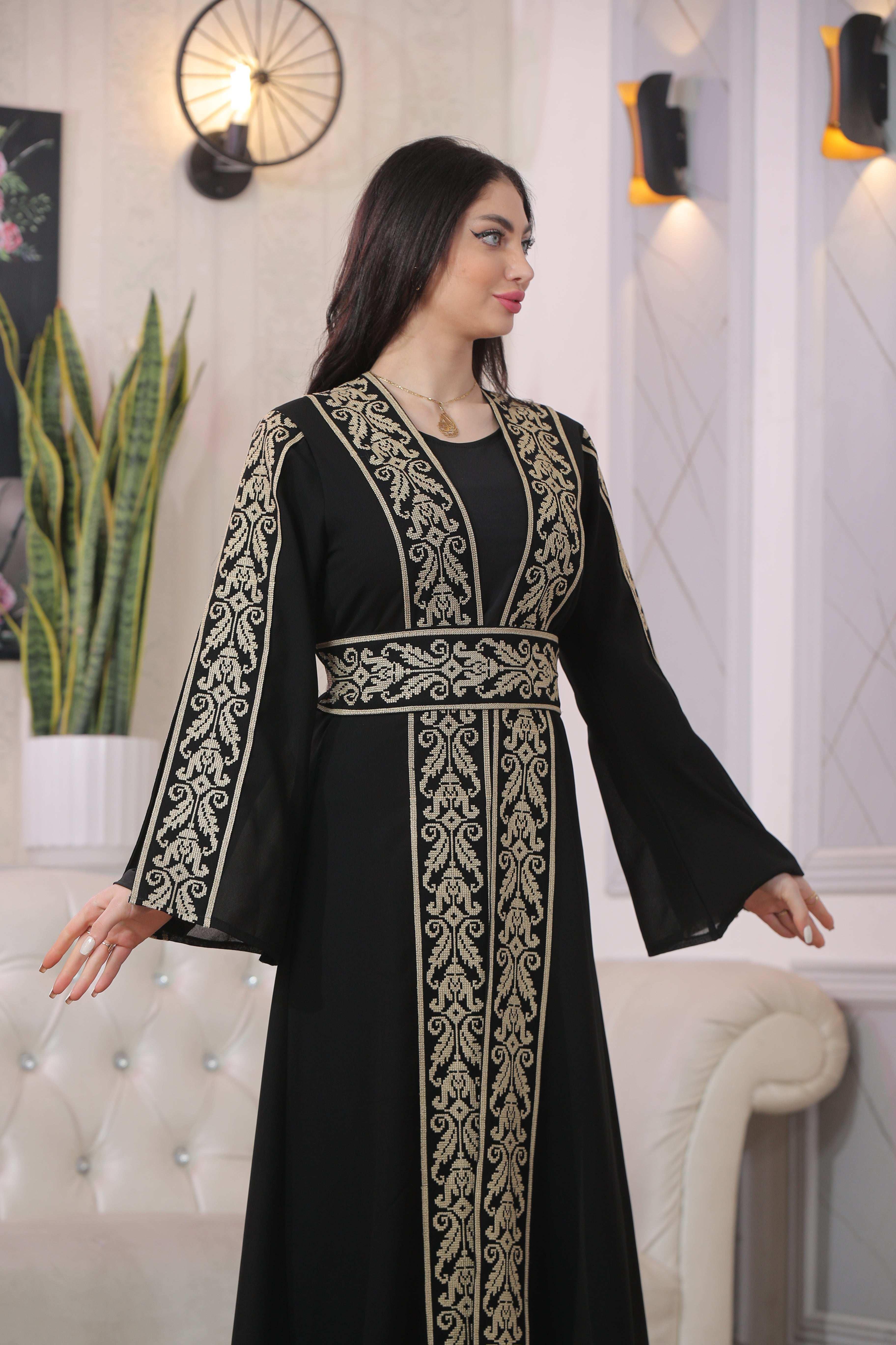 Black Shereen Embroidered Bisht Abaya thoub with intricate gold embroidery on sleeves and front by Palestinian Elegance