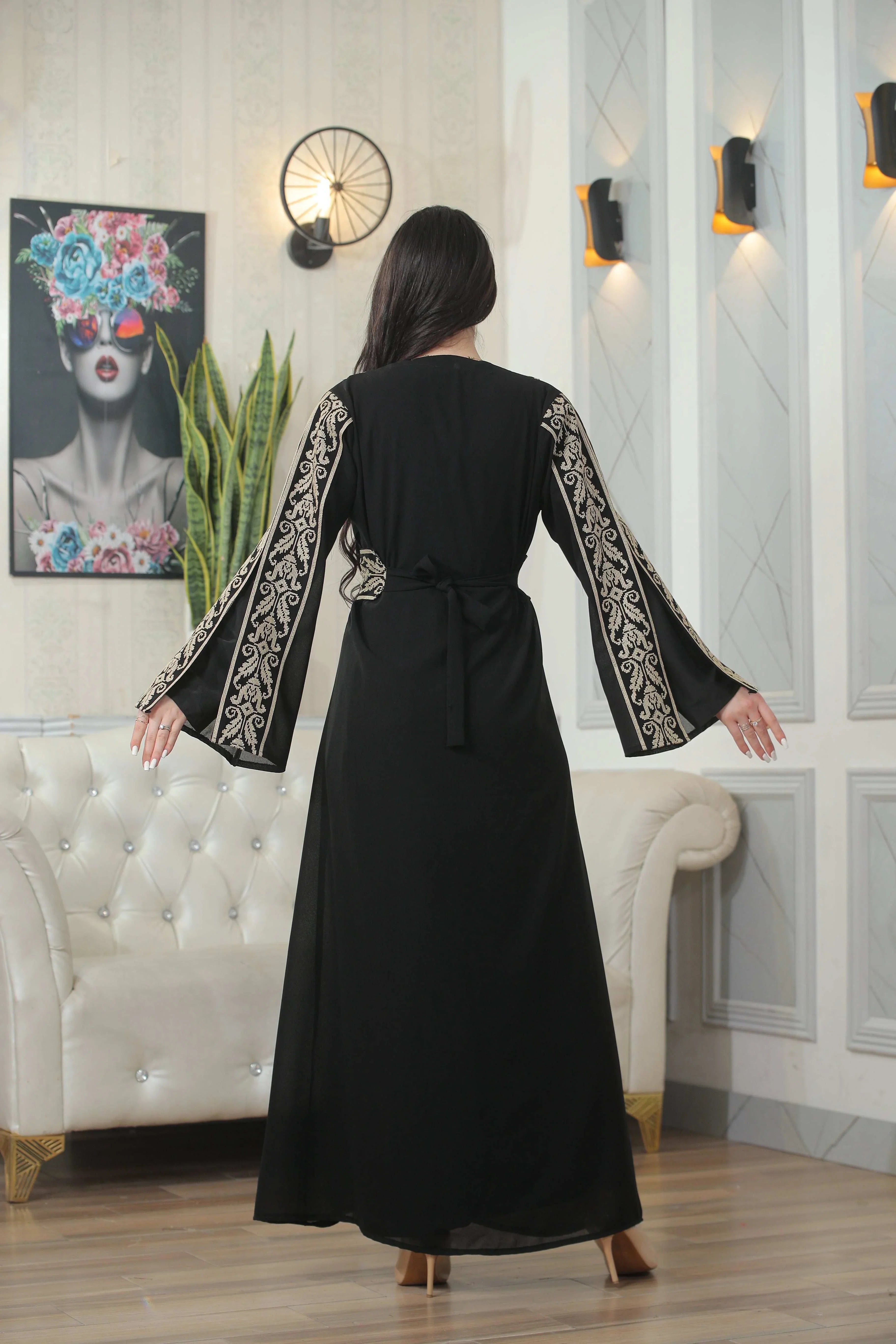 Back view of Shereen Embroidered Bisht Abaya by Palestinian Elegance with detailed sleeve embroidery