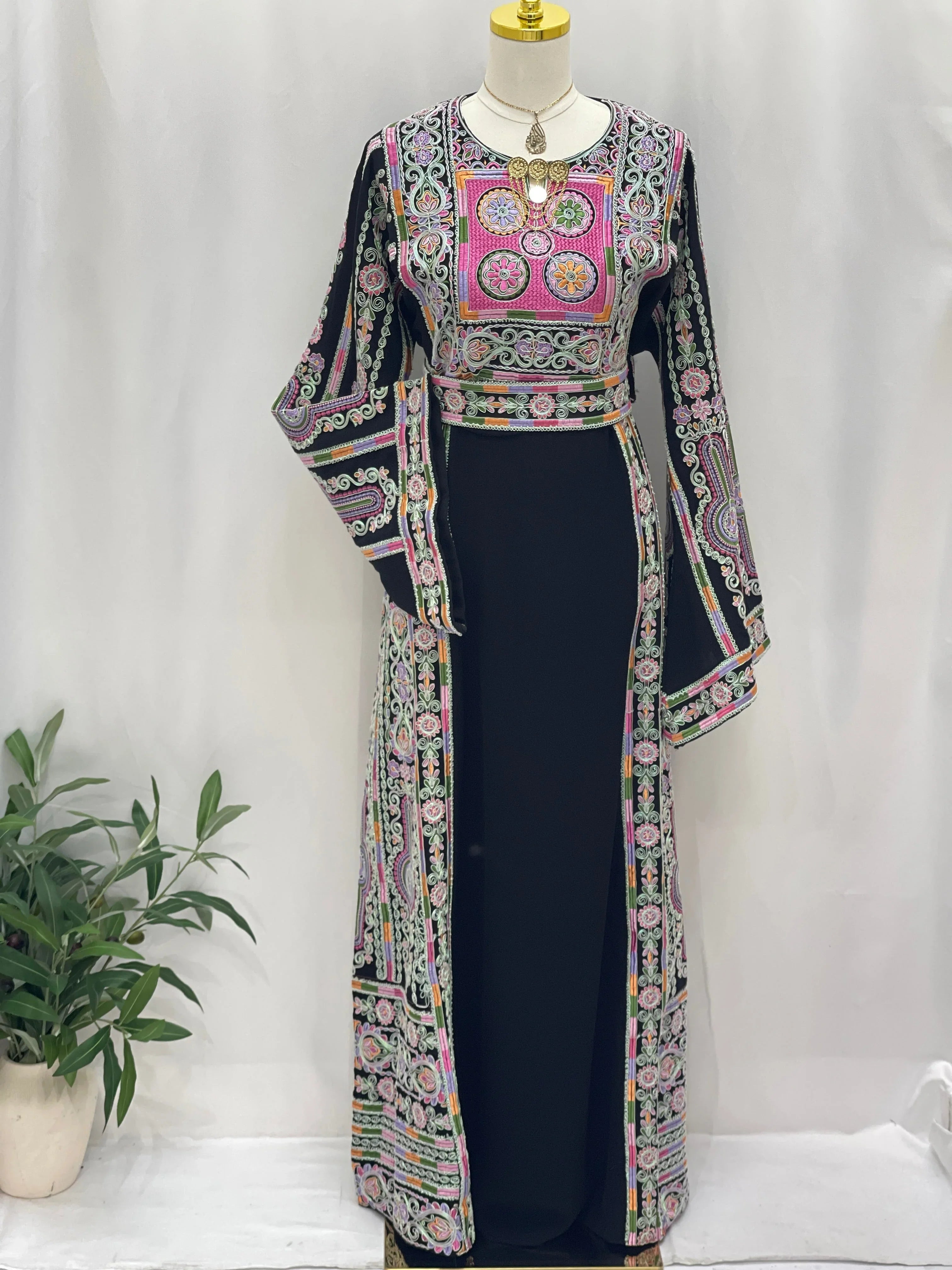 Palestinian Elegance Silver Piping Embroidered Thobe black maxi thobe with pink green traditional embroidery and wide sleeves