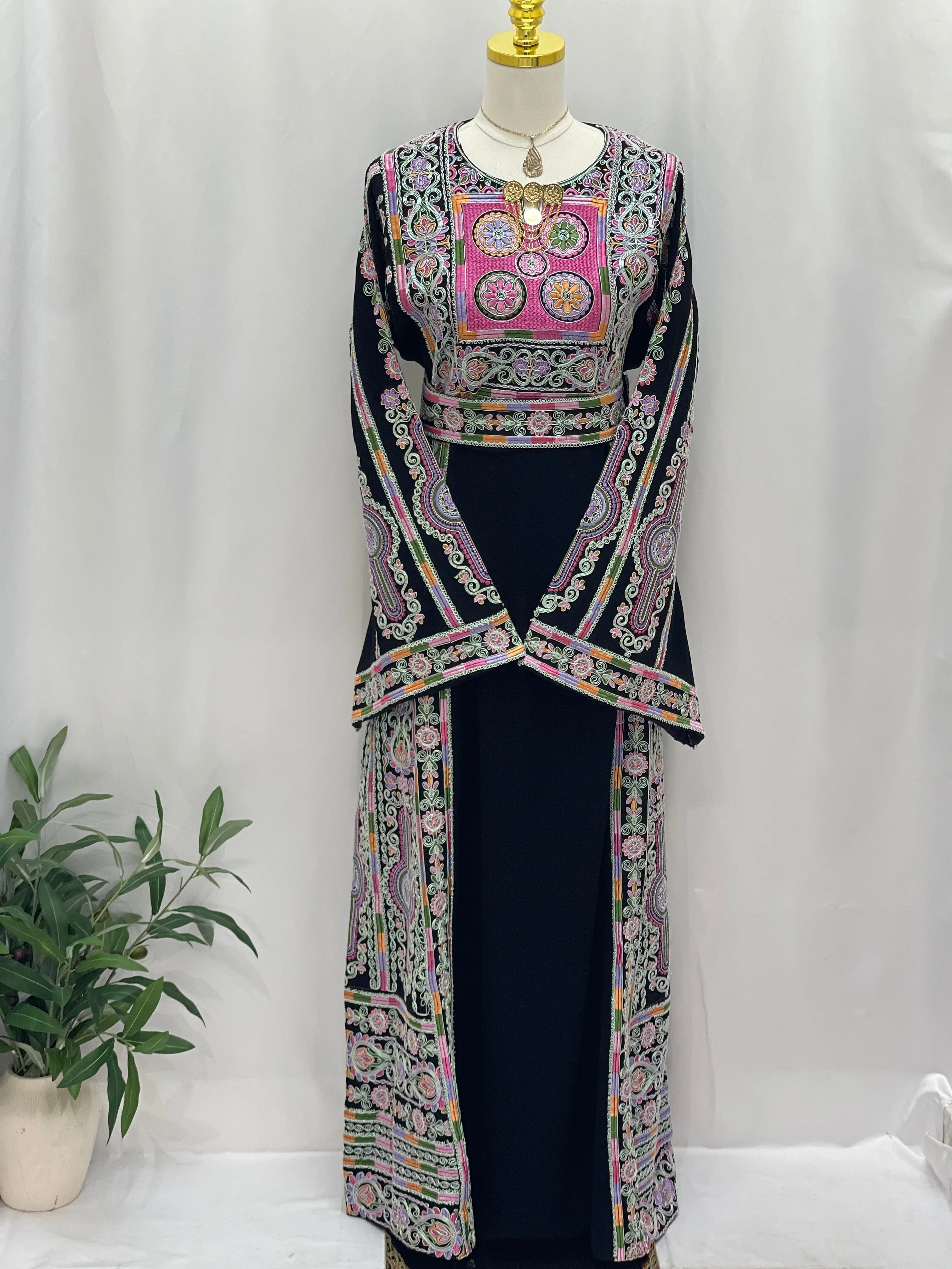 Palestinian Elegance Silver Piping Embroidered Thobe navy gown with intricate pink green geometric chest and sleeve embroidery