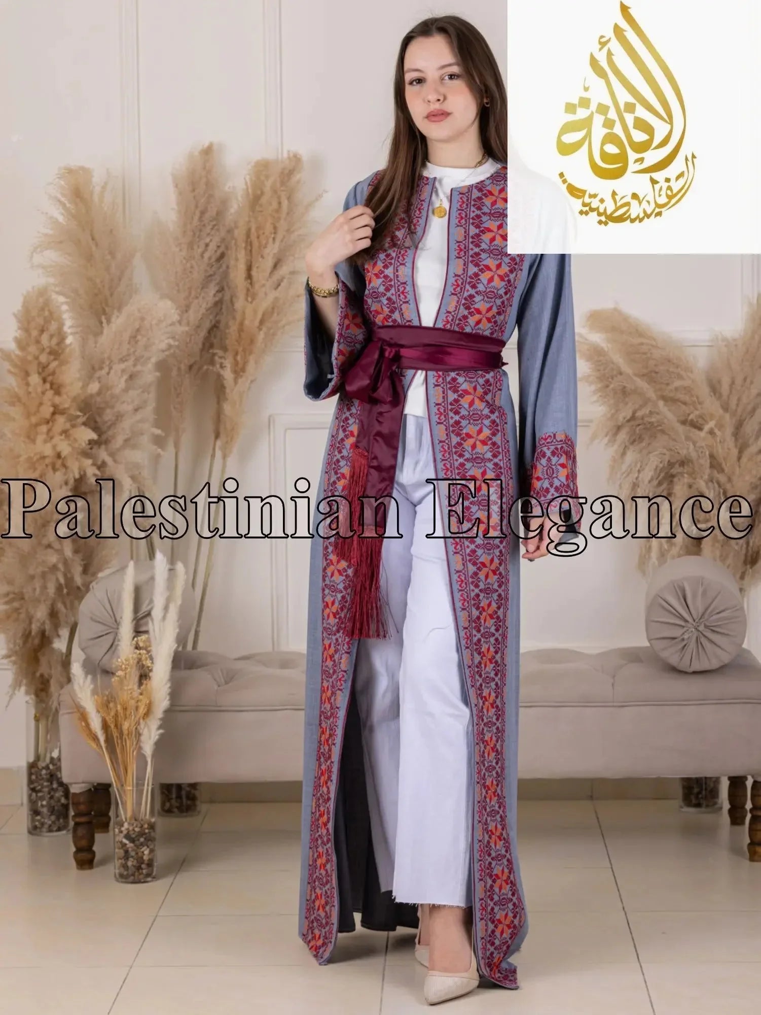 Palestinian Elegance Thoub featuring intricate Tahreer Embroidery Bisht design with maroon sash belt