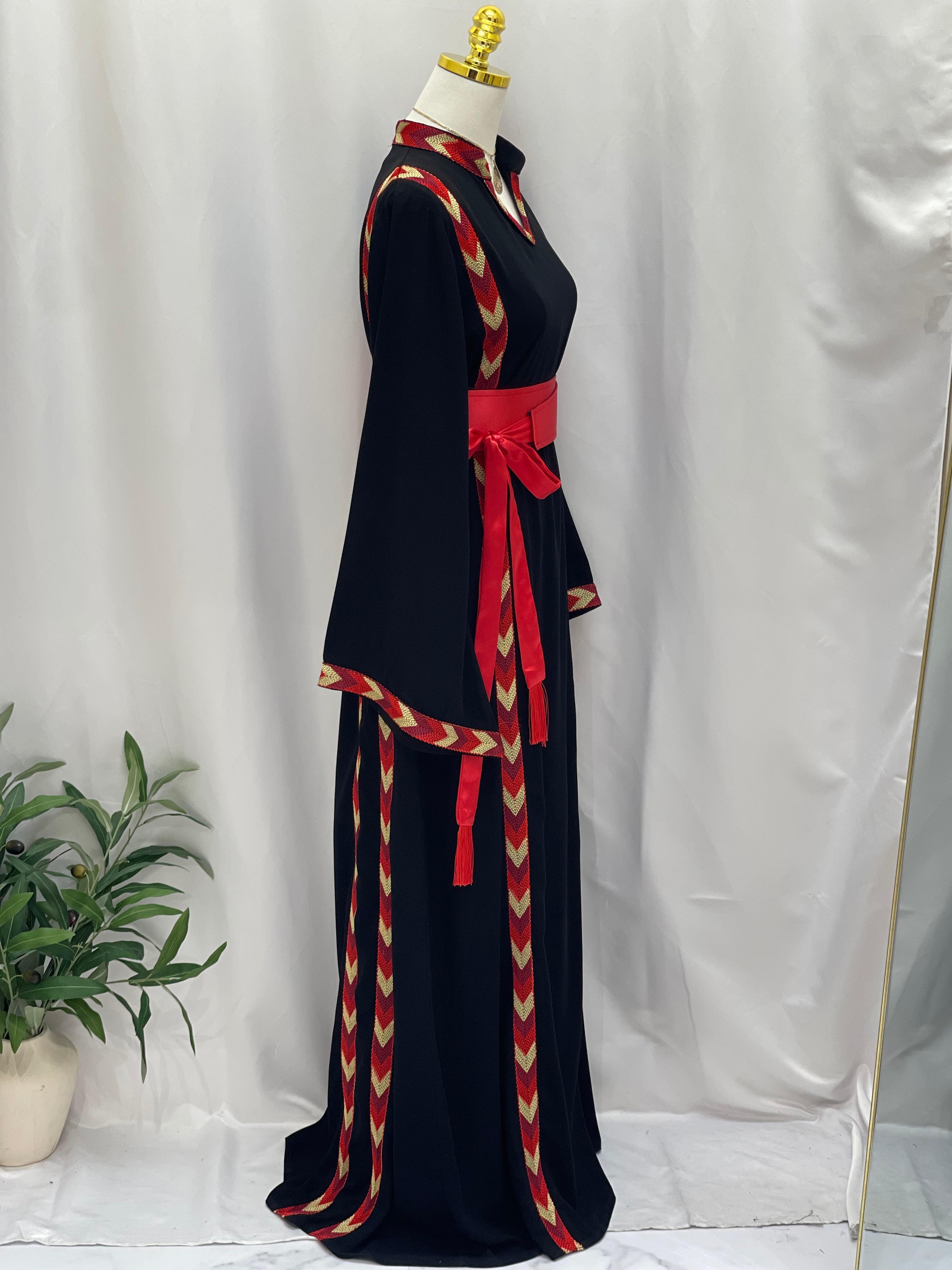 Palestinian Elegance traditional Palestinian thobe black embroidery dress with red sash and patterned trim