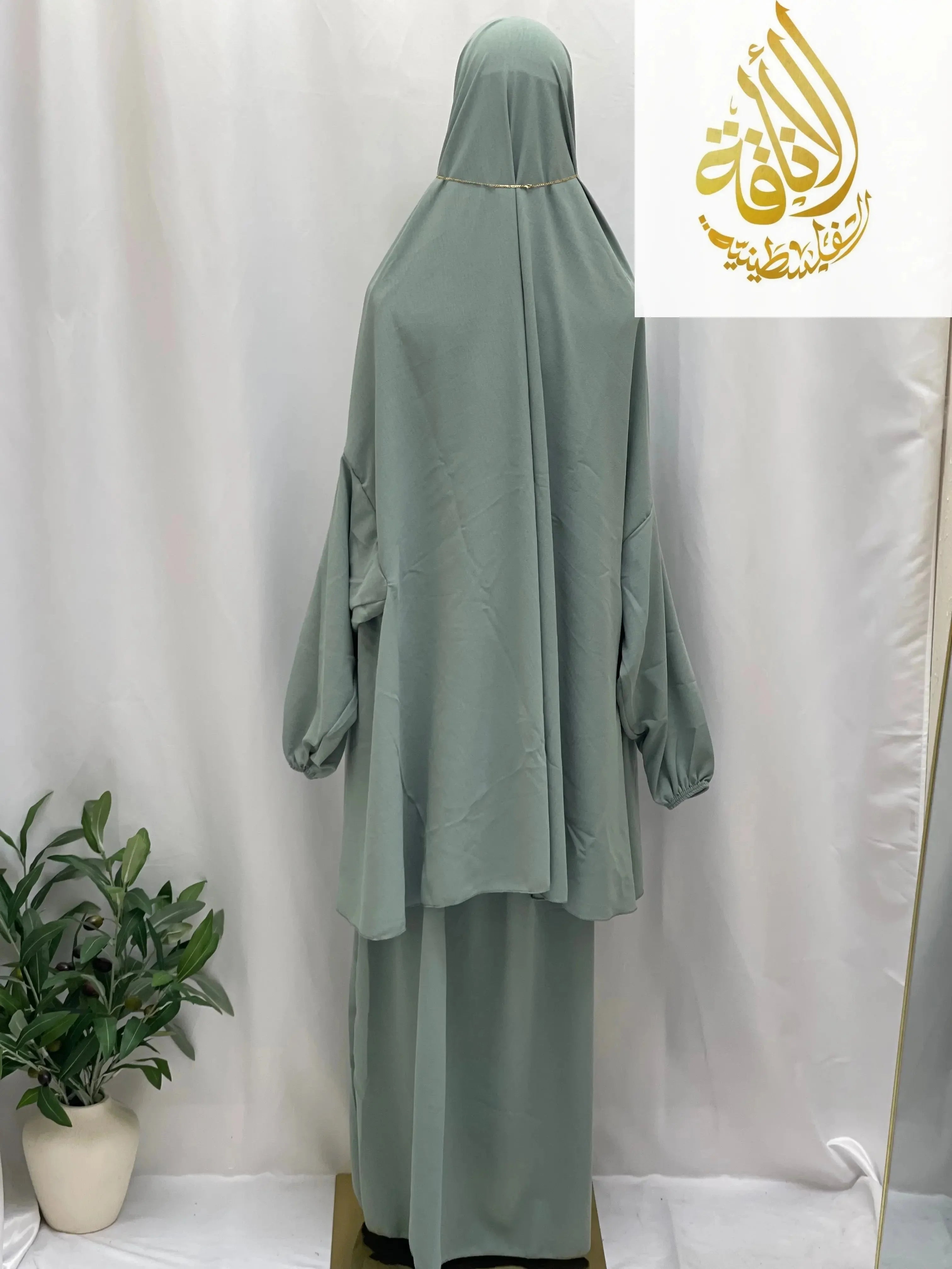 Palestinian Elegance two piece prayer outfit in soft green with loose fit and modest coverage