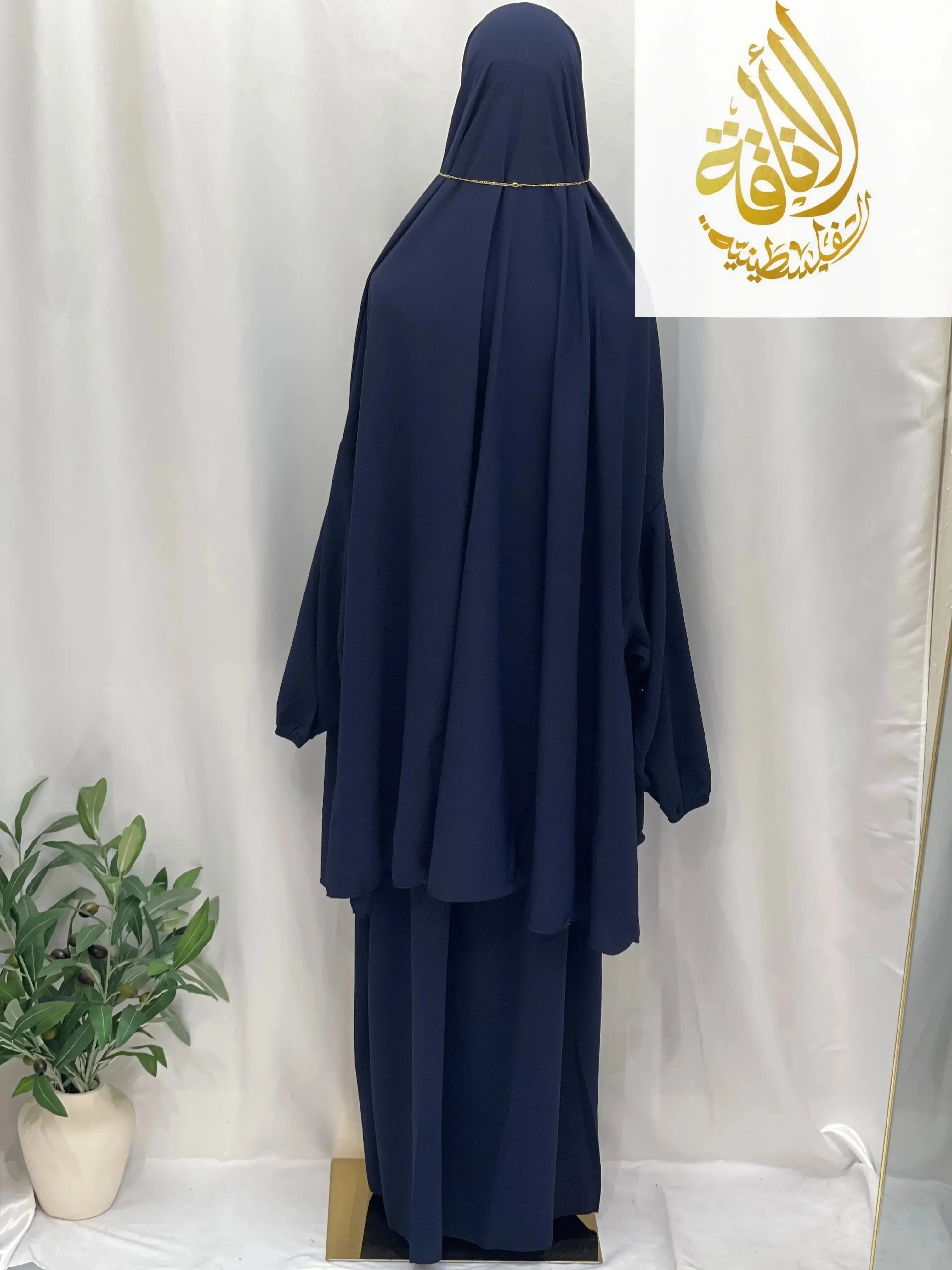 Palestinian Elegance navy blue two piece prayer outfit for special occasions with modest full coverage design