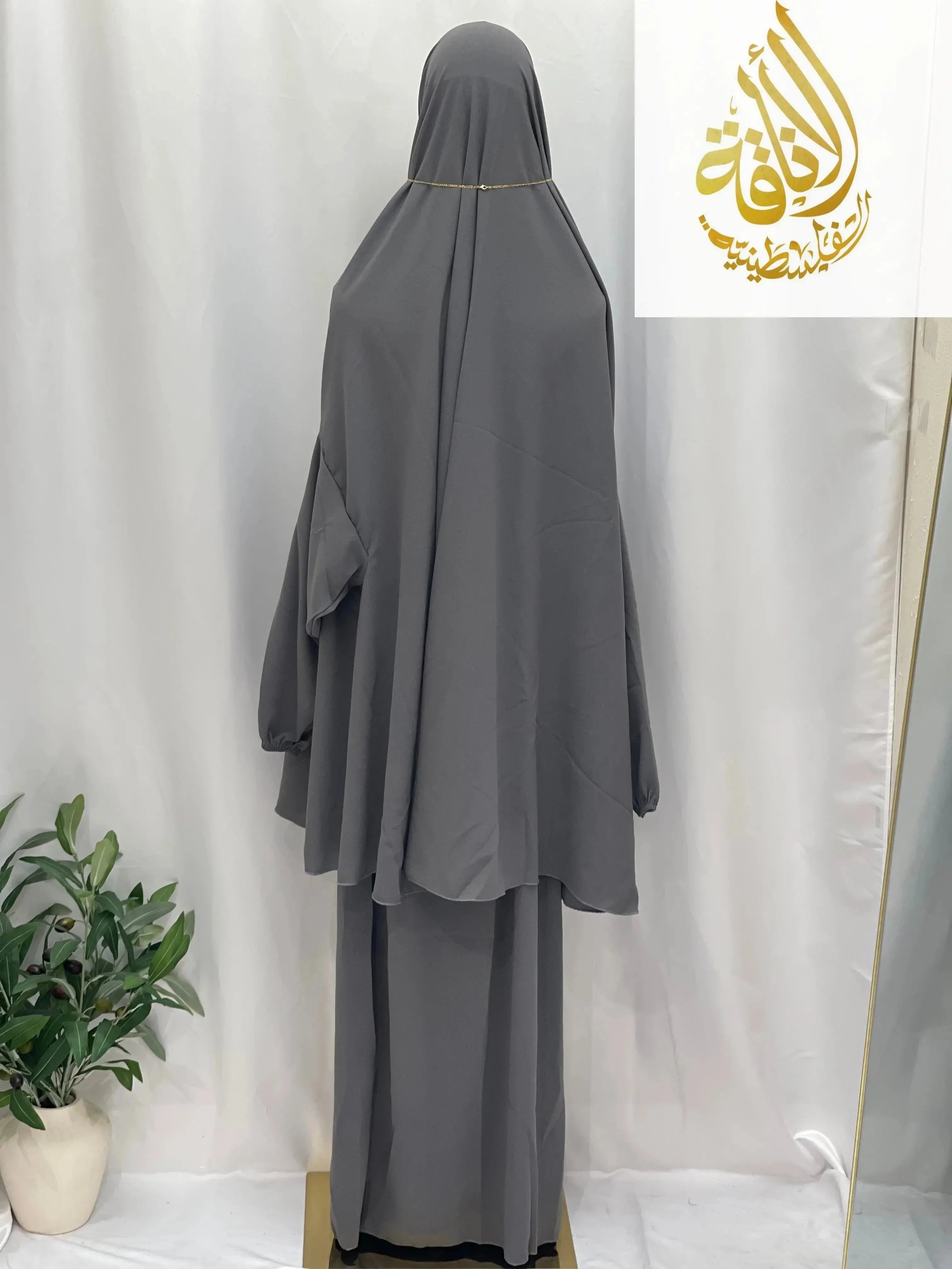 Palestinian Elegance gray two piece prayer outfit with loose fit and modest design for special occasions
